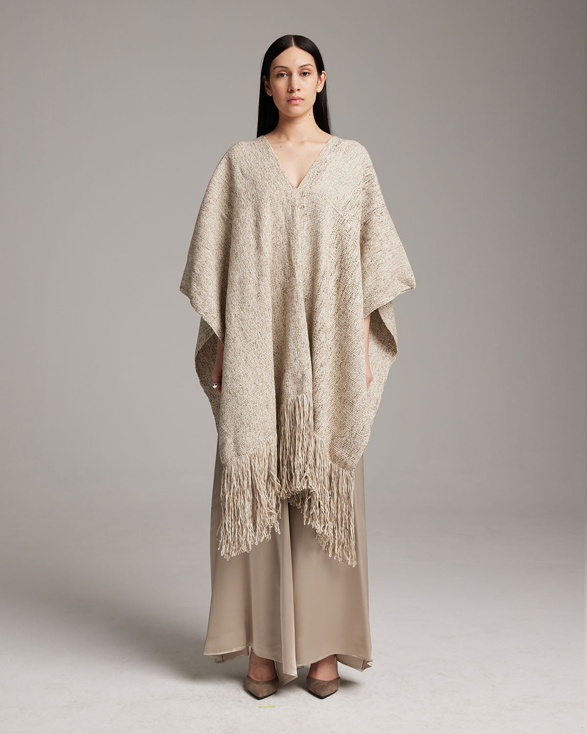 Model wearing a Long Marble Fringe Manta with fringes