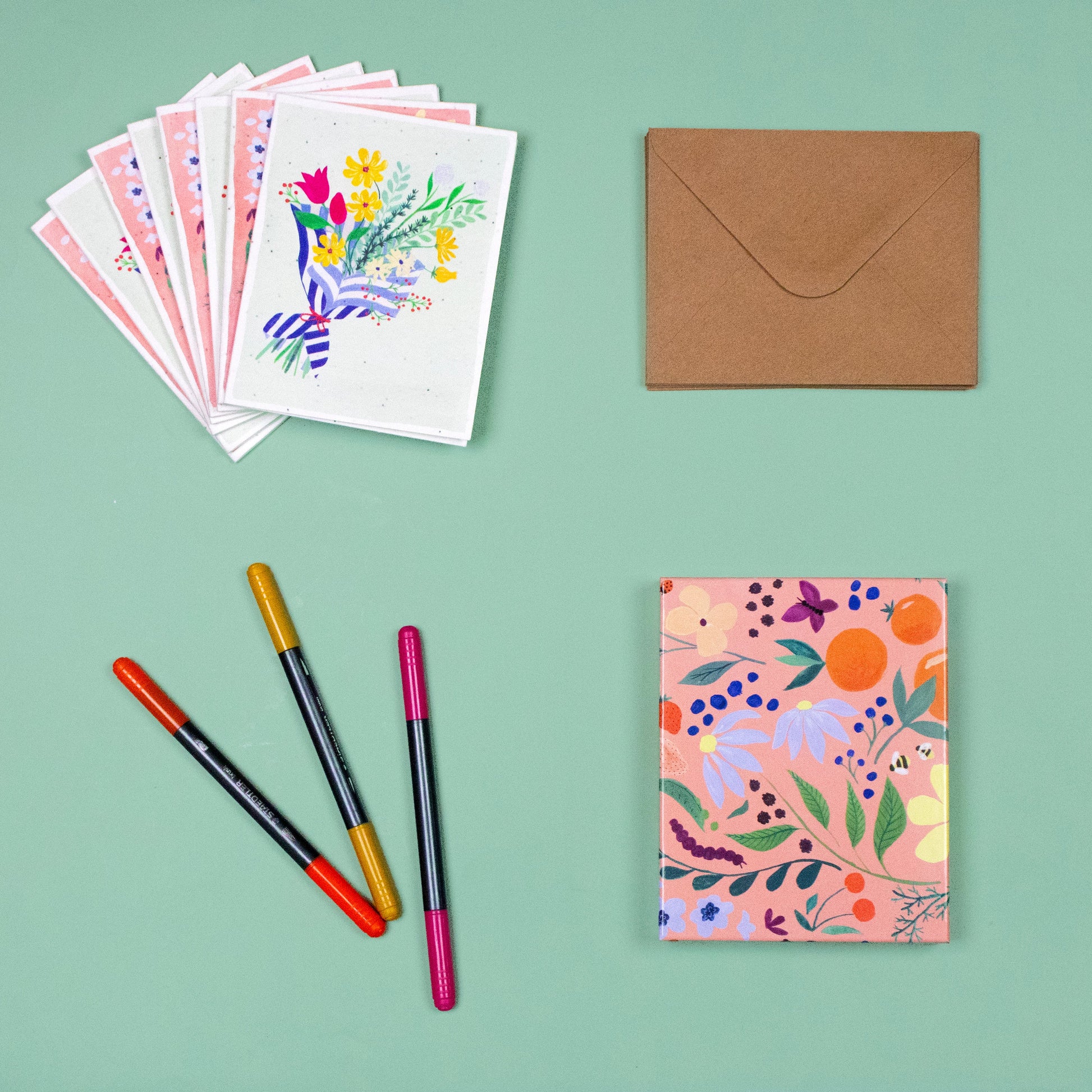 Seed card collection with kraft paper envelopes and artistic botanical designs, seed cards, floral seed cards. 