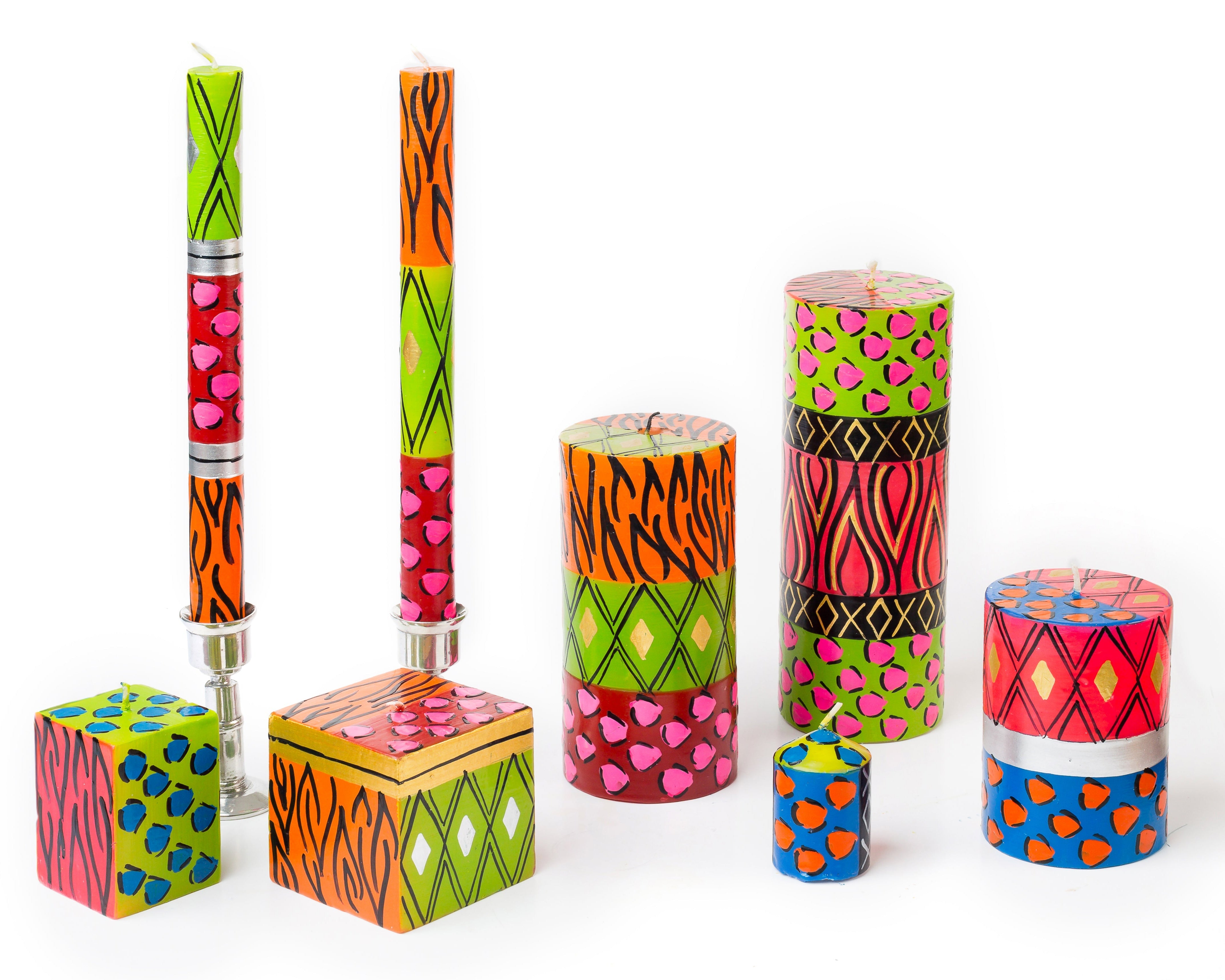 Group photo of the Wild Animal candle collection. Hot pink, orange, lime green, turquoise and silver in animal print designs make these candles light up with color and fun!