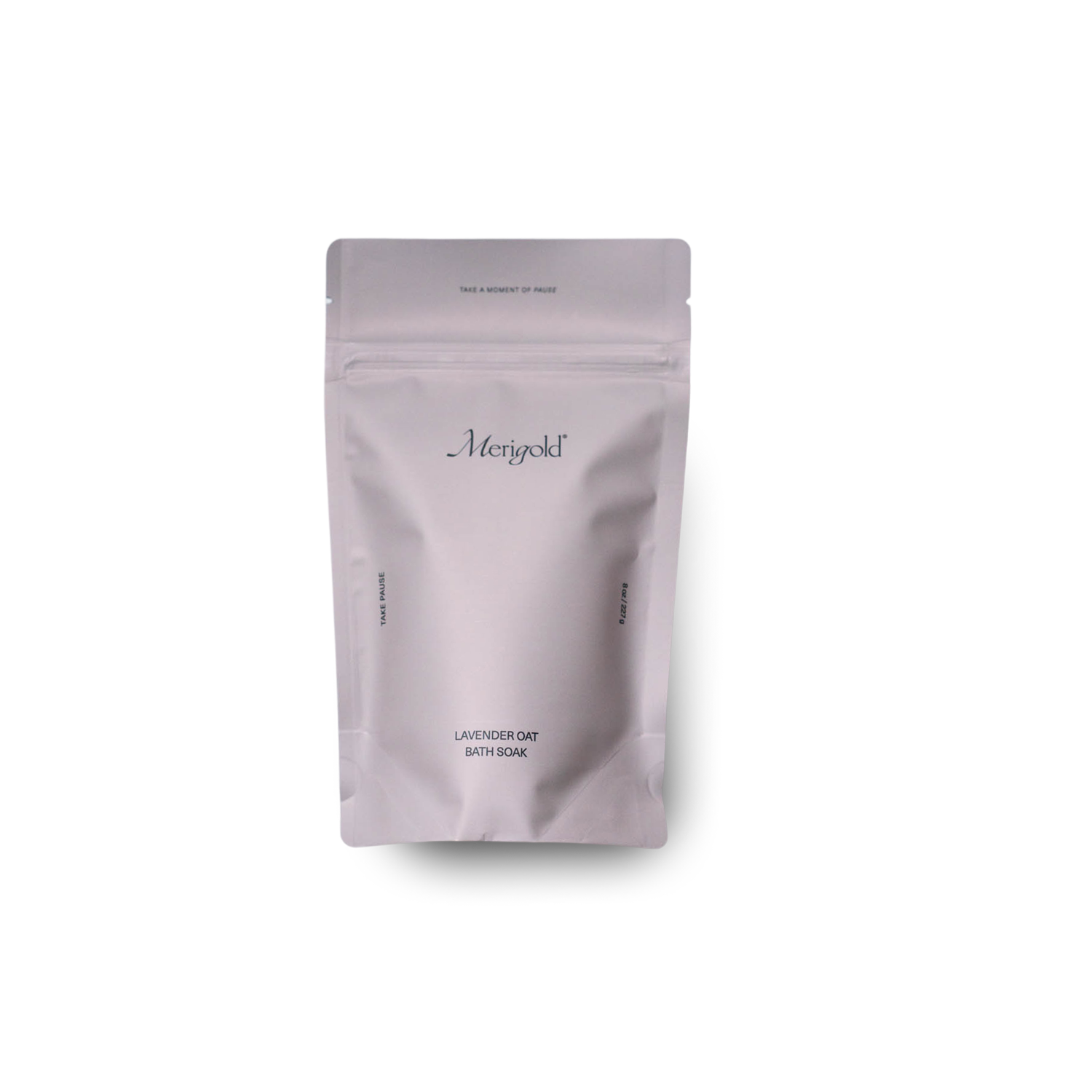 Merigold Lavender Oat Bath Soak is in a lavender resealable bag with a minimalist design, highlighting ingredients like organic oats, lavender flowers, and Epsom salt. Photographed on white background.