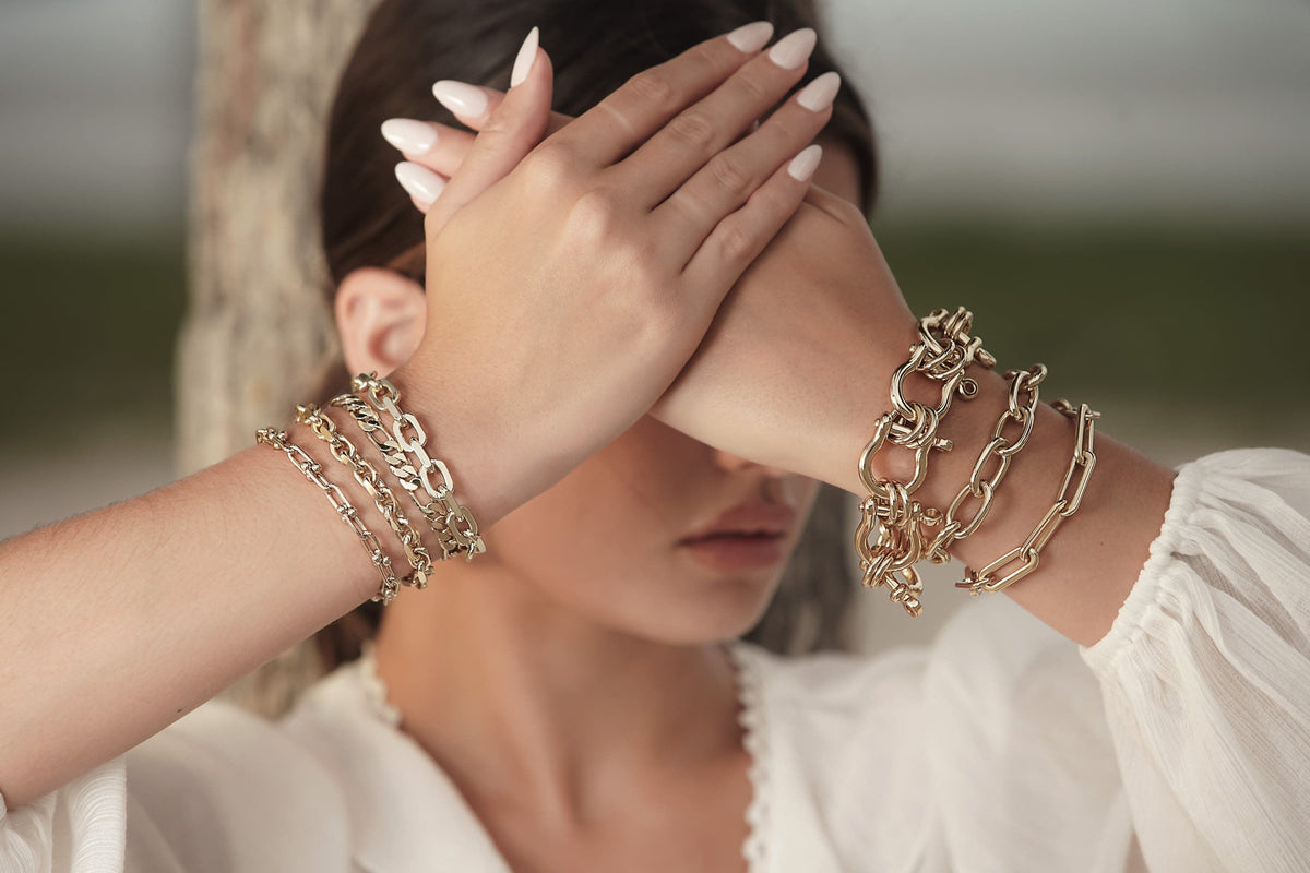 Gold chain bracelets from the Gianni Bracelet collection, stylish and shiny accessory for any look