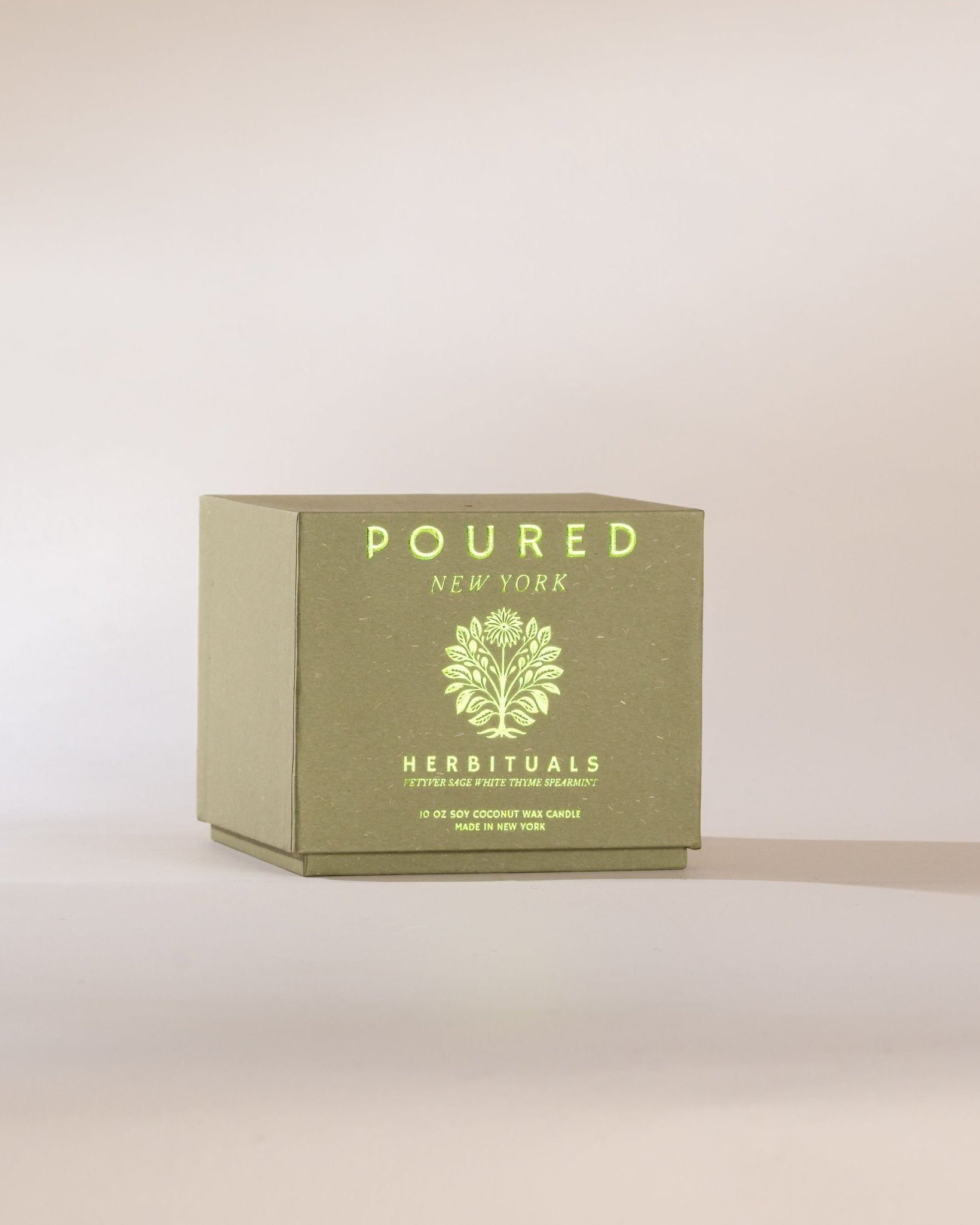 Green box with 'POURED NEW YORK' branding on a beige background