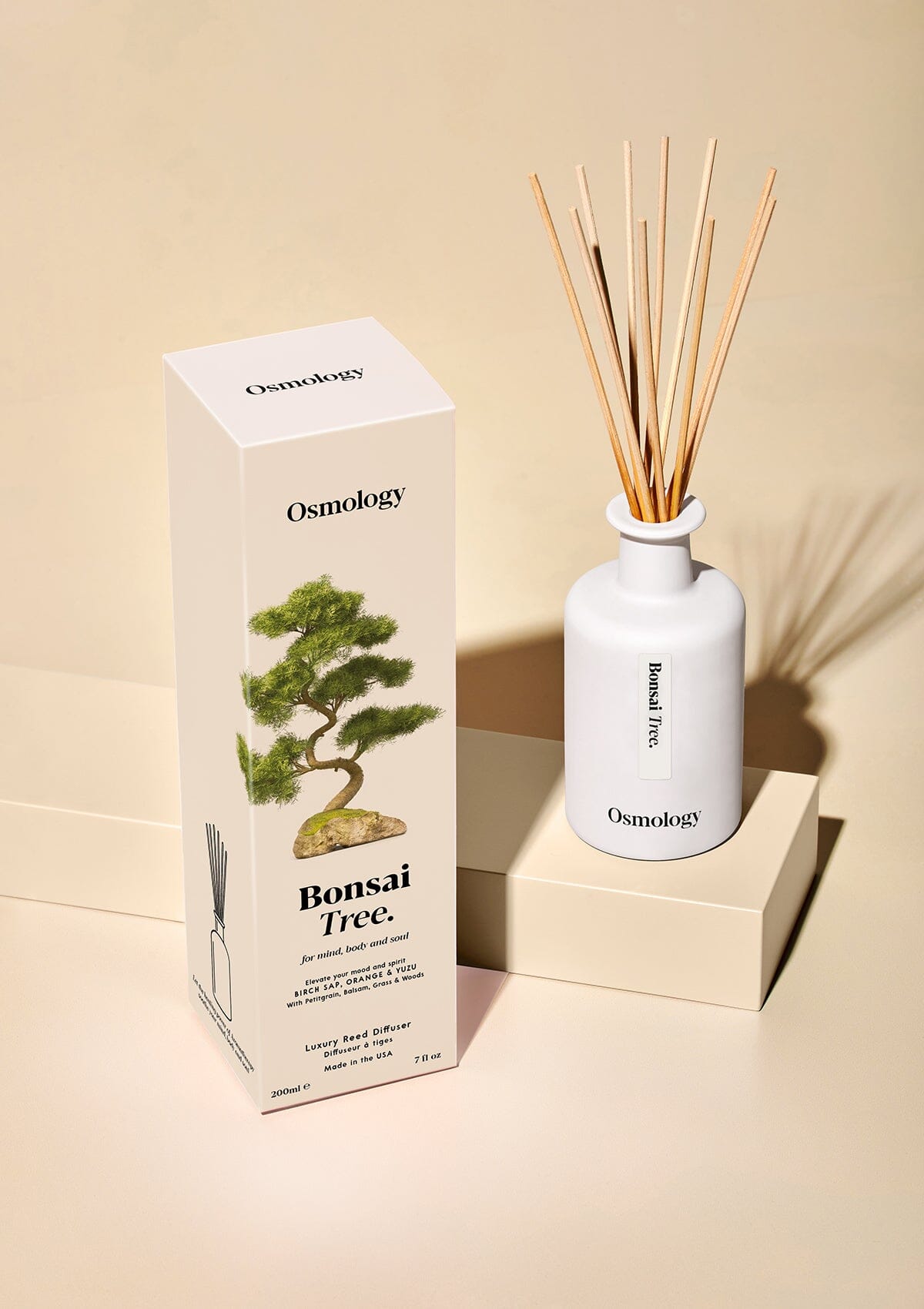 Osmology Bonsai Tree Diffuser with product packaging on white background