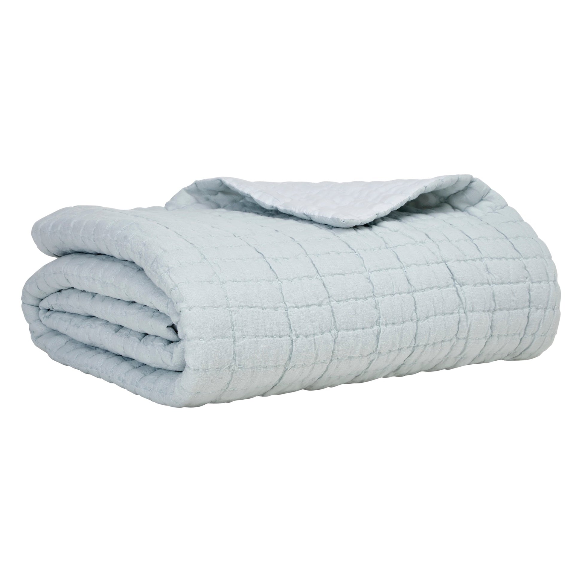 QT-373-11096_6|Light blue textured quilt, neatly folded, showcasing its soft fabric and inviting texture, ideal for cozy bedding.