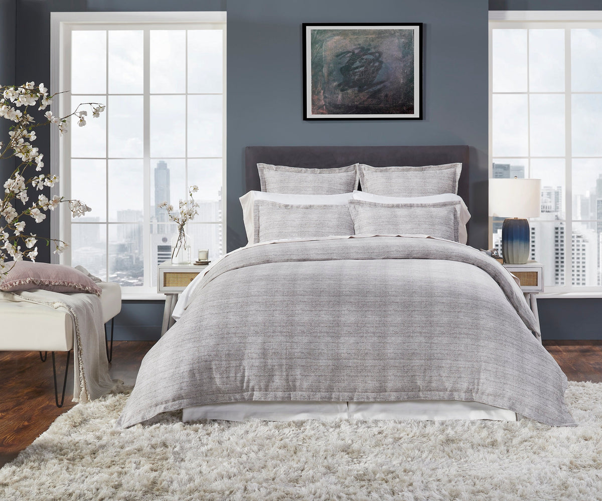 DT-032-X_1|Modern grey textured duvet cover creating a chic focal point in a contemporary bedroom setting.