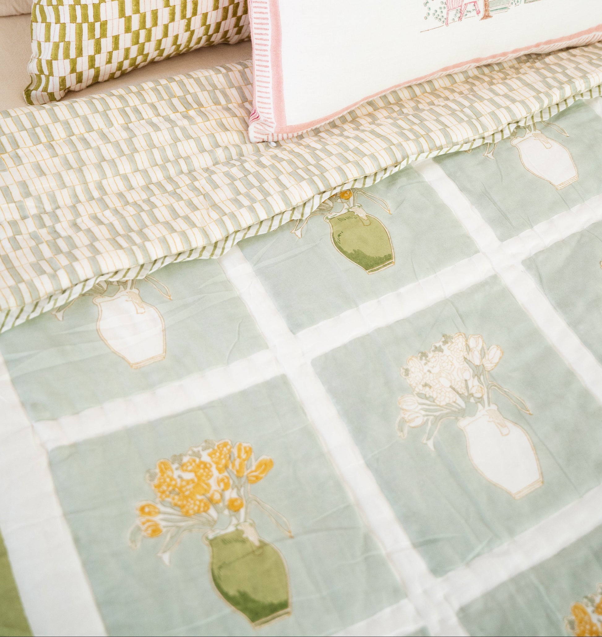 Reversible hand-block printed cotton throw, 50×70 inches, featuring different artisanal patterns on both sides.