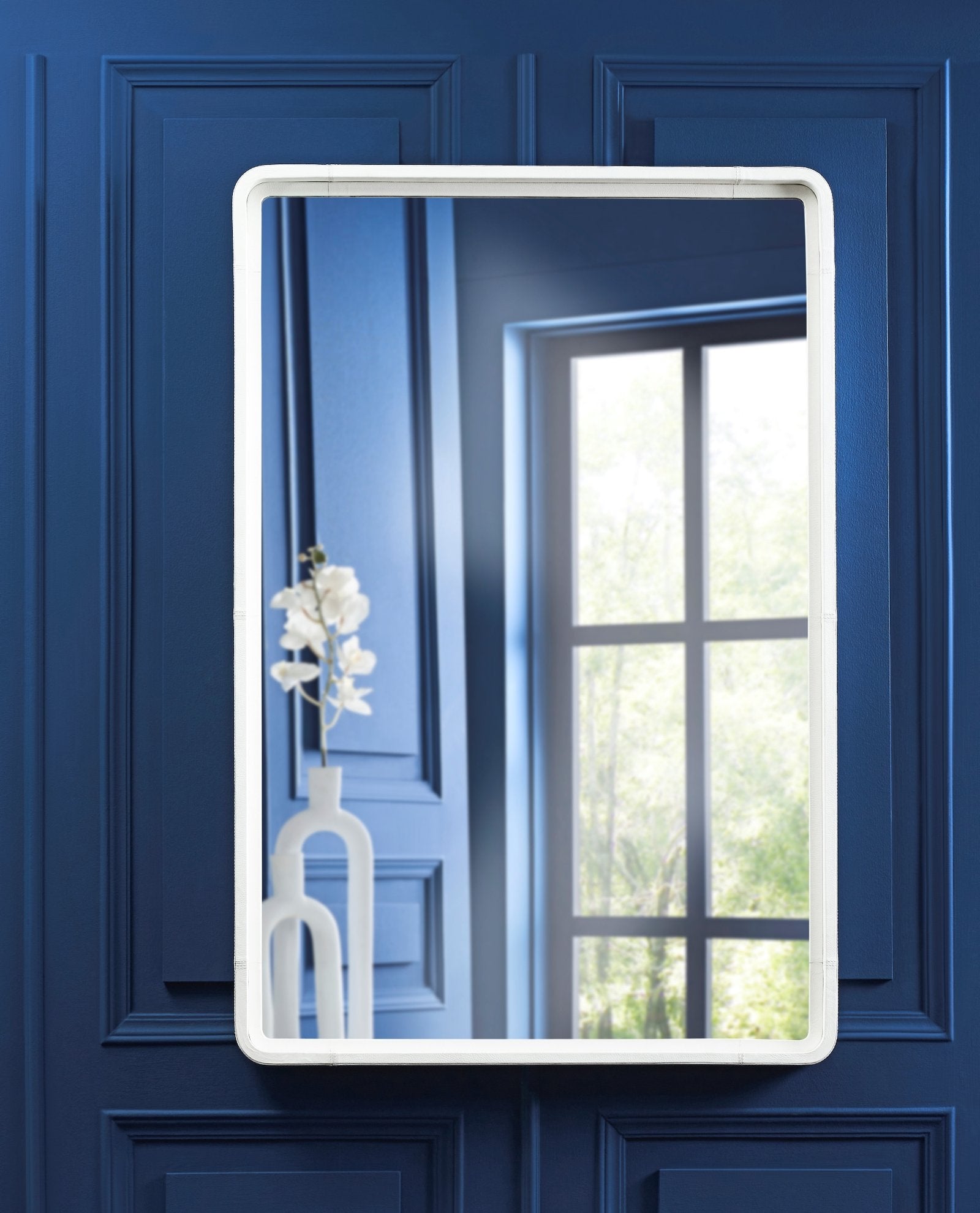 FN-5201-363554_3|Elegant rectangular wall mirror with a pristine white leather frame, adding a touch of modern luxury to sophisticated home decor.