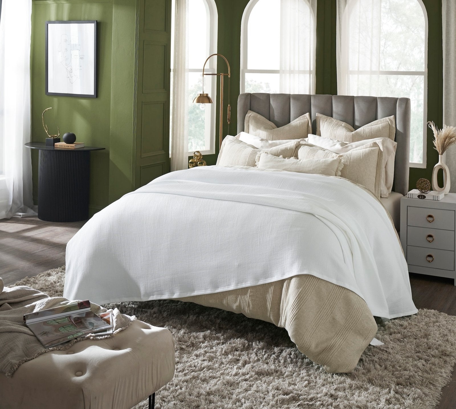 BL-858-11096_2|Crisp white woven blanket elegantly draped over a luxurious bed, adding a touch of comfort and style to the modern bedroom.