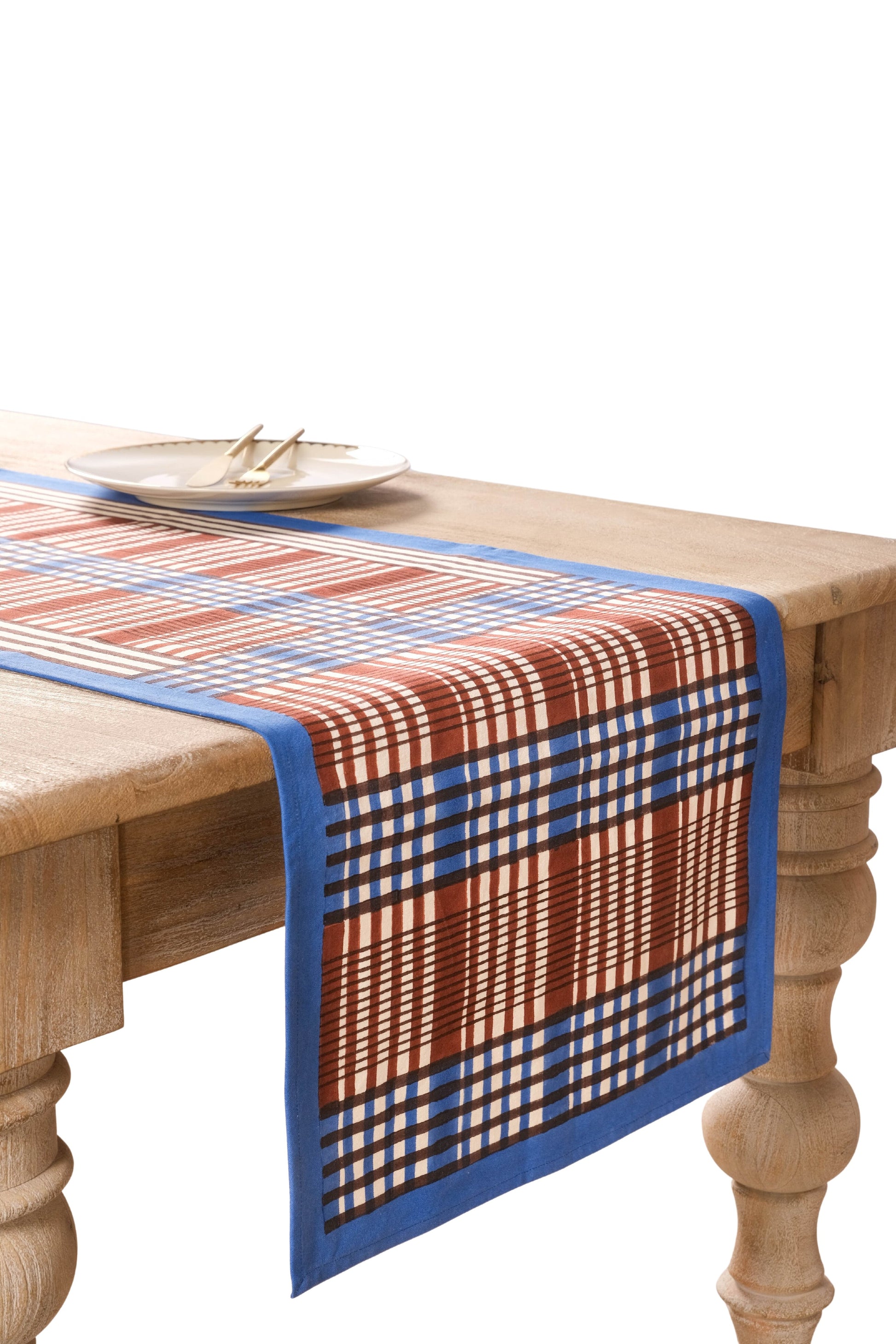 Brown and blue Shetland blockprint taberunner on wooden table