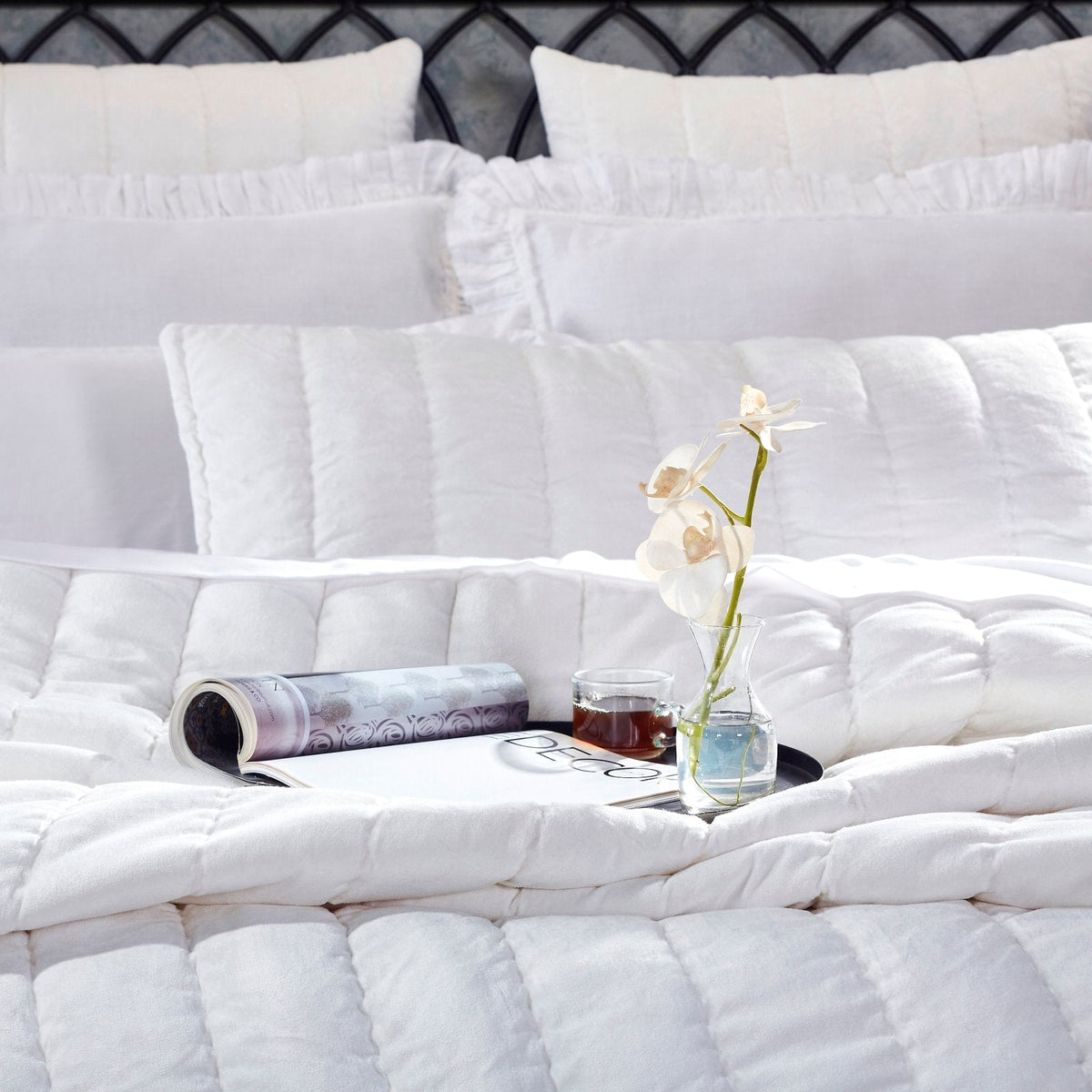 QT-337-11096_3|Crisp white quilted quilt adding luxurious comfort to a modern bedroom. Features a soft, textured finish for elegance.