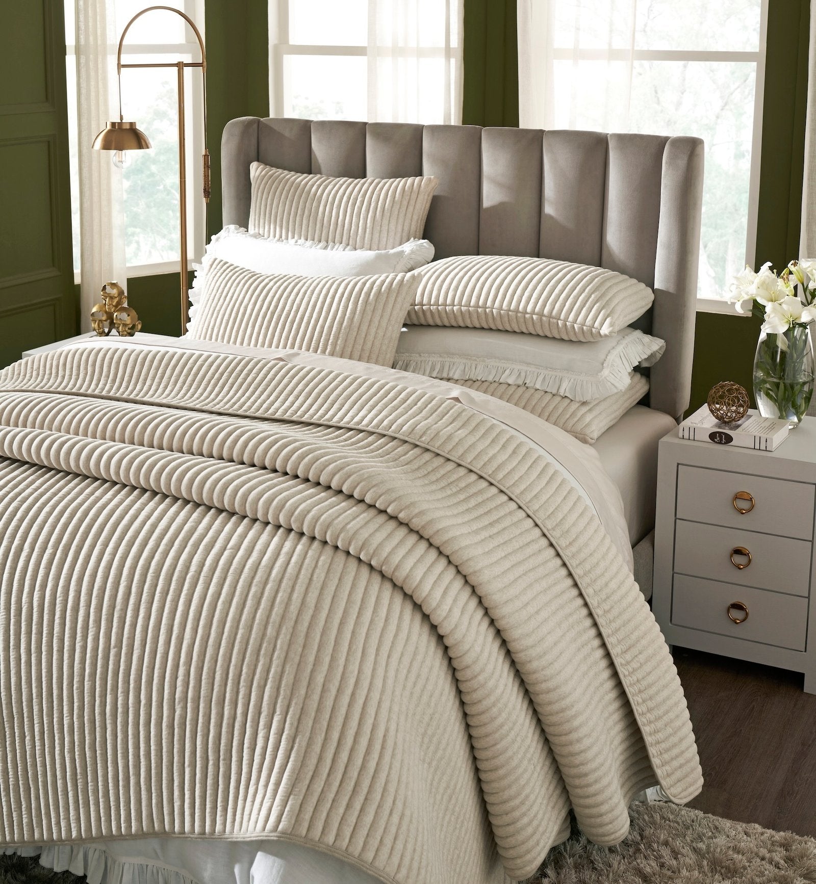 QT-368-9496_3|Luxurious beige ribbed velvet quilt on a stylish bed with matching pillows, adding elegance to the bedroom.
