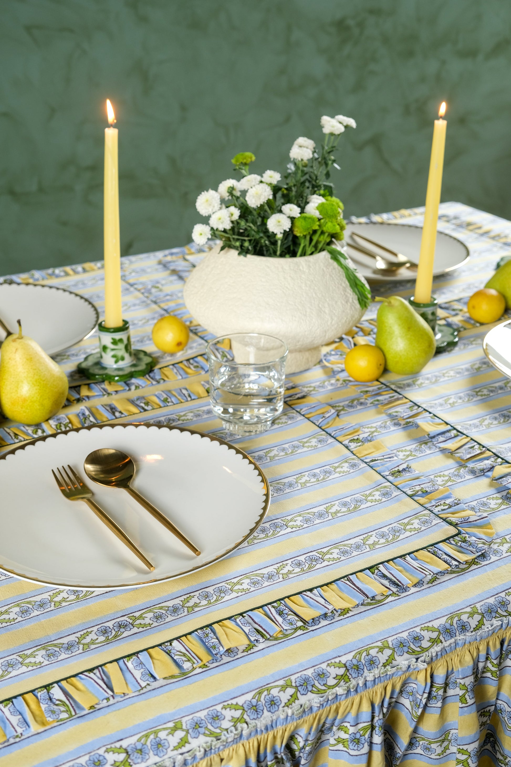 Table setting with butter yellow Provence blockprint placemats