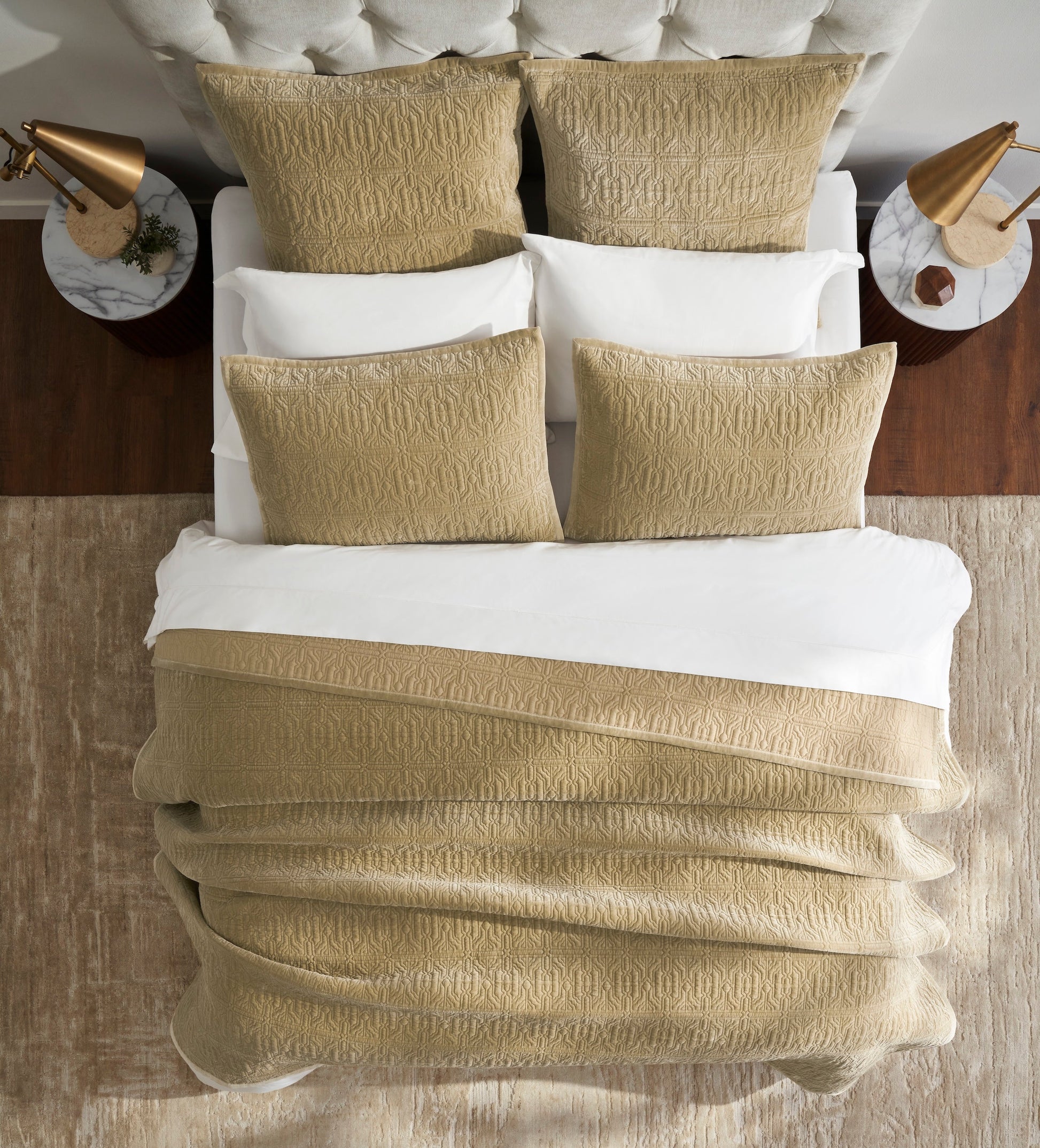 QT-377-11096_4|Elegant tan quilted bedspread with a geometric pattern, draped over a bed with white sheets and pillows, enhancing cozy bedroom decor.