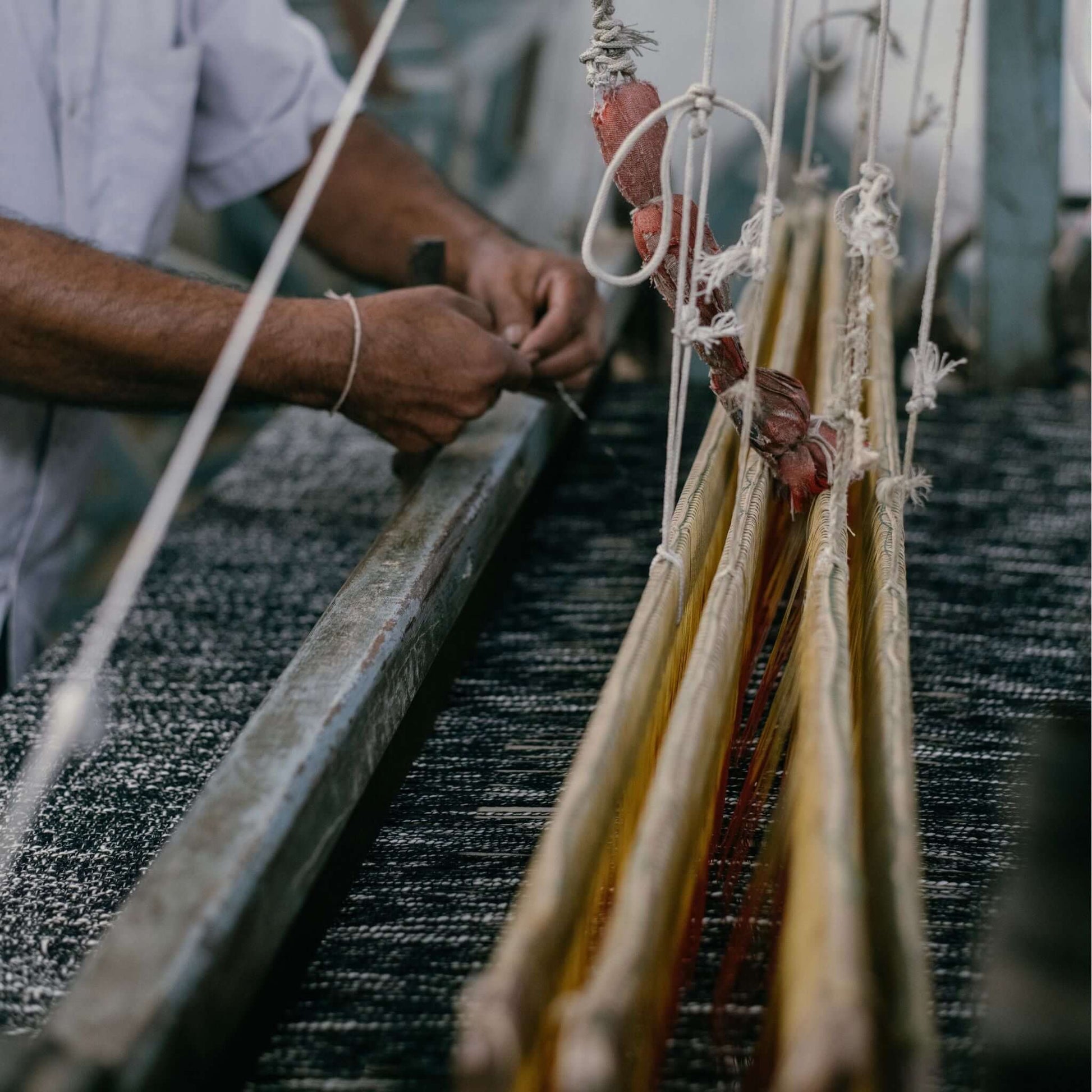Silica Chalk Off White And Gray Stripes Pattern Soft Handwoven Merino Throw being handmade on weaving loom.