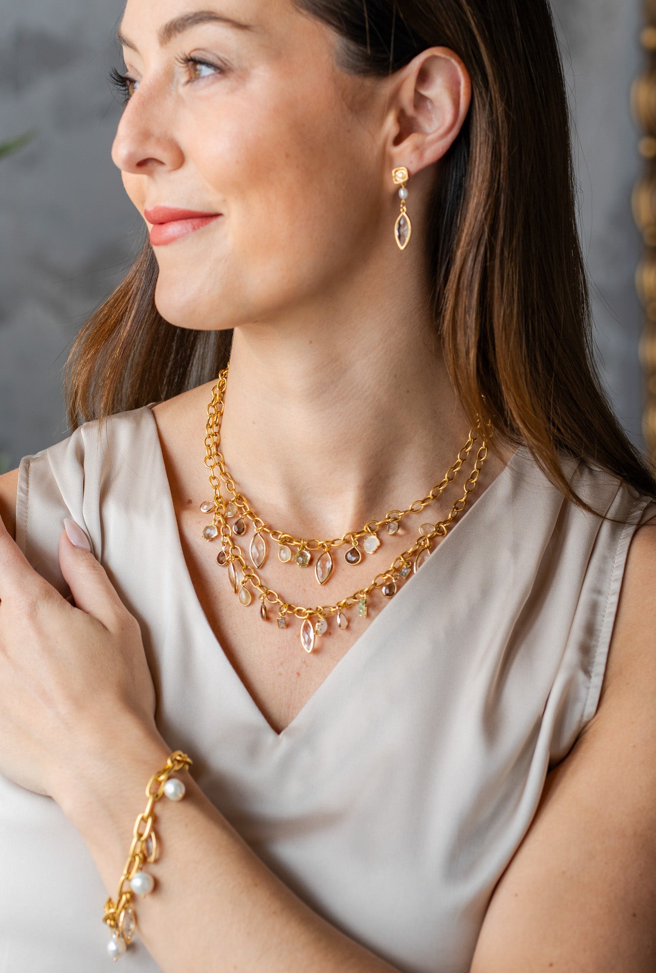 Double-strand Layered Gemstone Charm Necklace with faceted gemstone drops in gold, handcrafted by Loni Paul Jewelry.