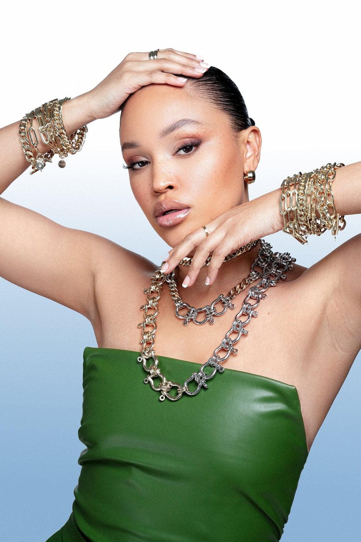 Woman wearing the stylish Enzo Toggle Chain Bracelet with jewelry in the shot