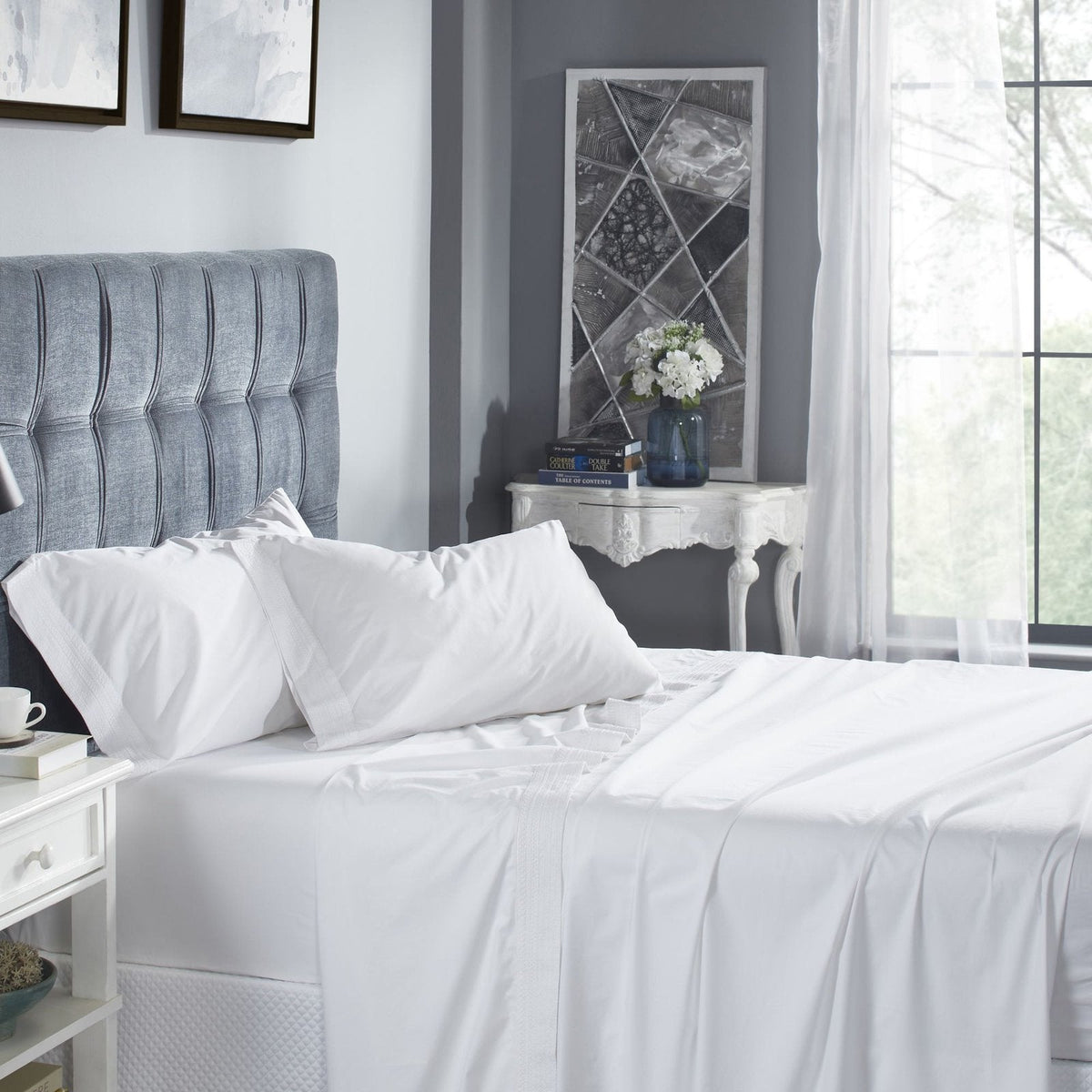 QSS-520-6080_2|Fresh white 100% cotton sheets and pillowcases on a bed, offering crisp comfort for a peaceful night's sleep.