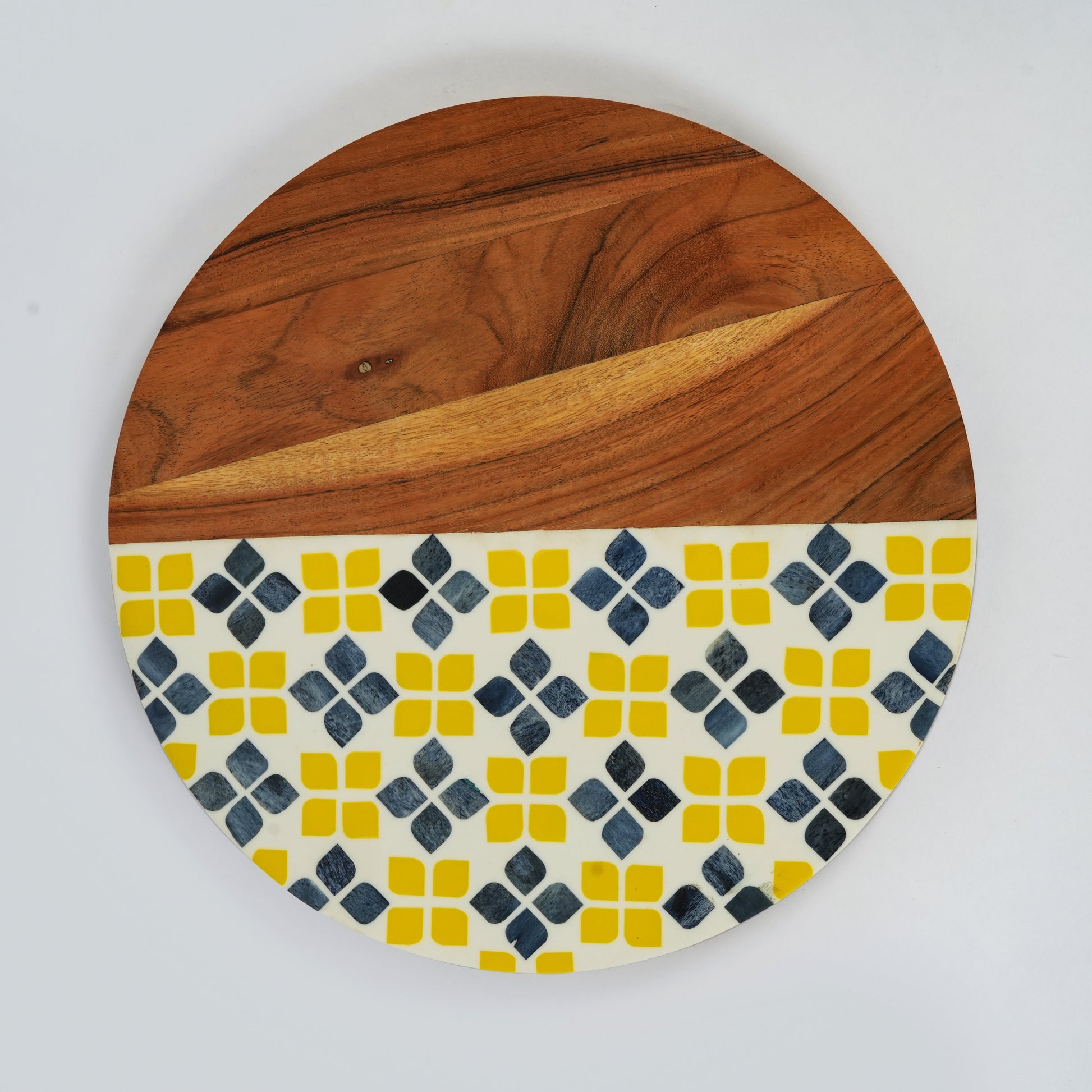 Studio shot of the Marigold Mosaic serve board showing the half-and-half contrast of wood and floral inlay.