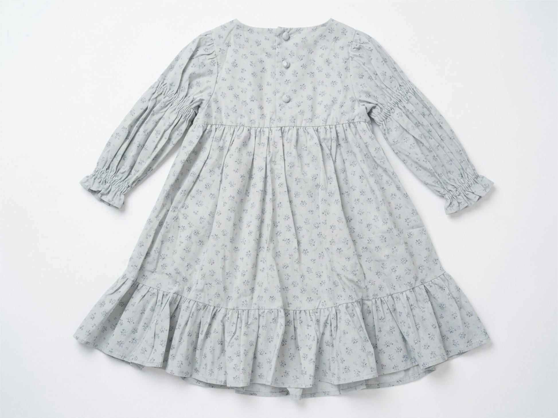 Gray dress with floral pattern on a white background