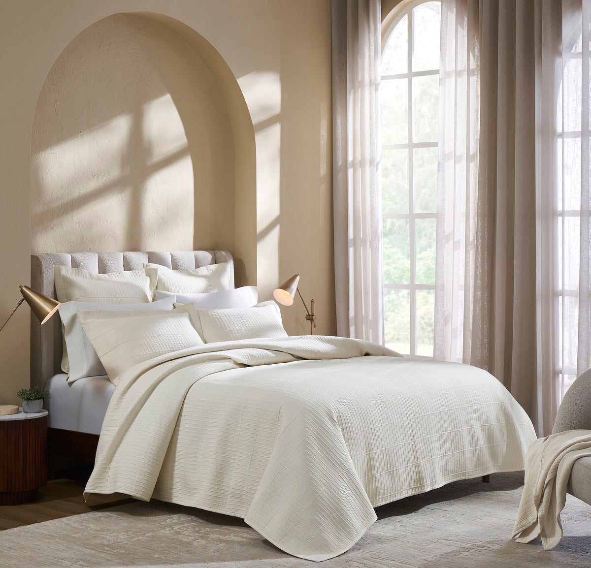 CL-271-9496_1|Luxurious cream textured coverlet with subtle grid pattern, draped elegantly on a bed, offering sophisticated comfort for modern bedrooms.