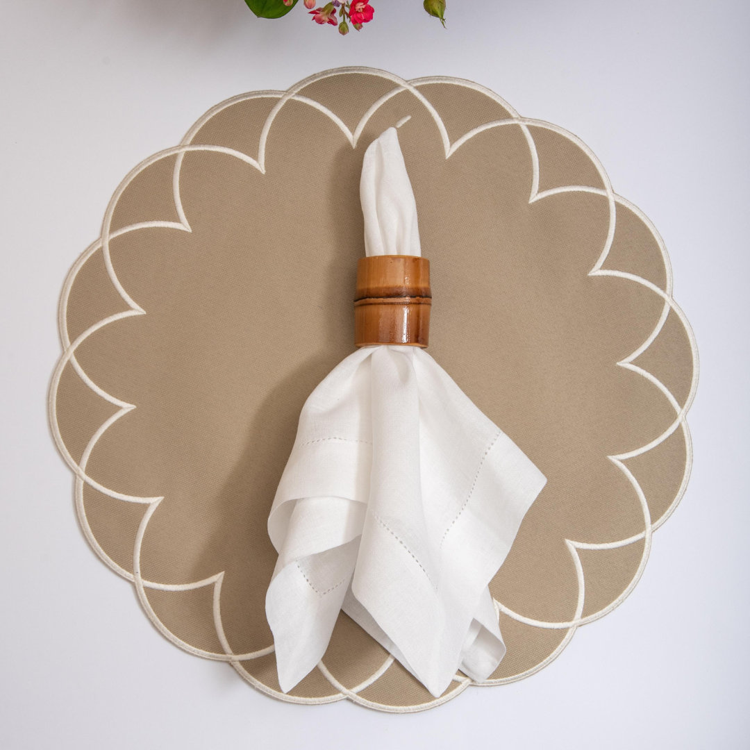 Arc impermeable placemat with embroidered border in Fendi by Talah Home — spill-proof Brazilian table decor