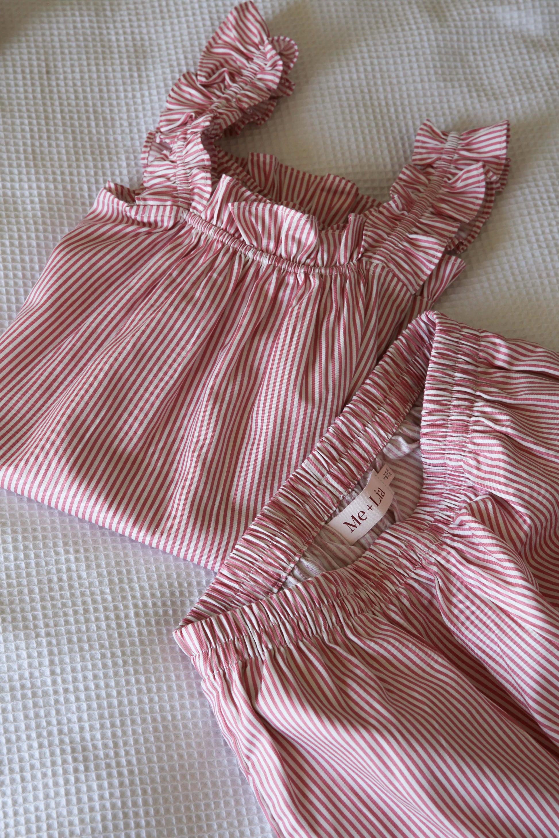 Stella Lounge Set Pink lifestyle — women's premium cotton stripe resort loungewear set styled for travel