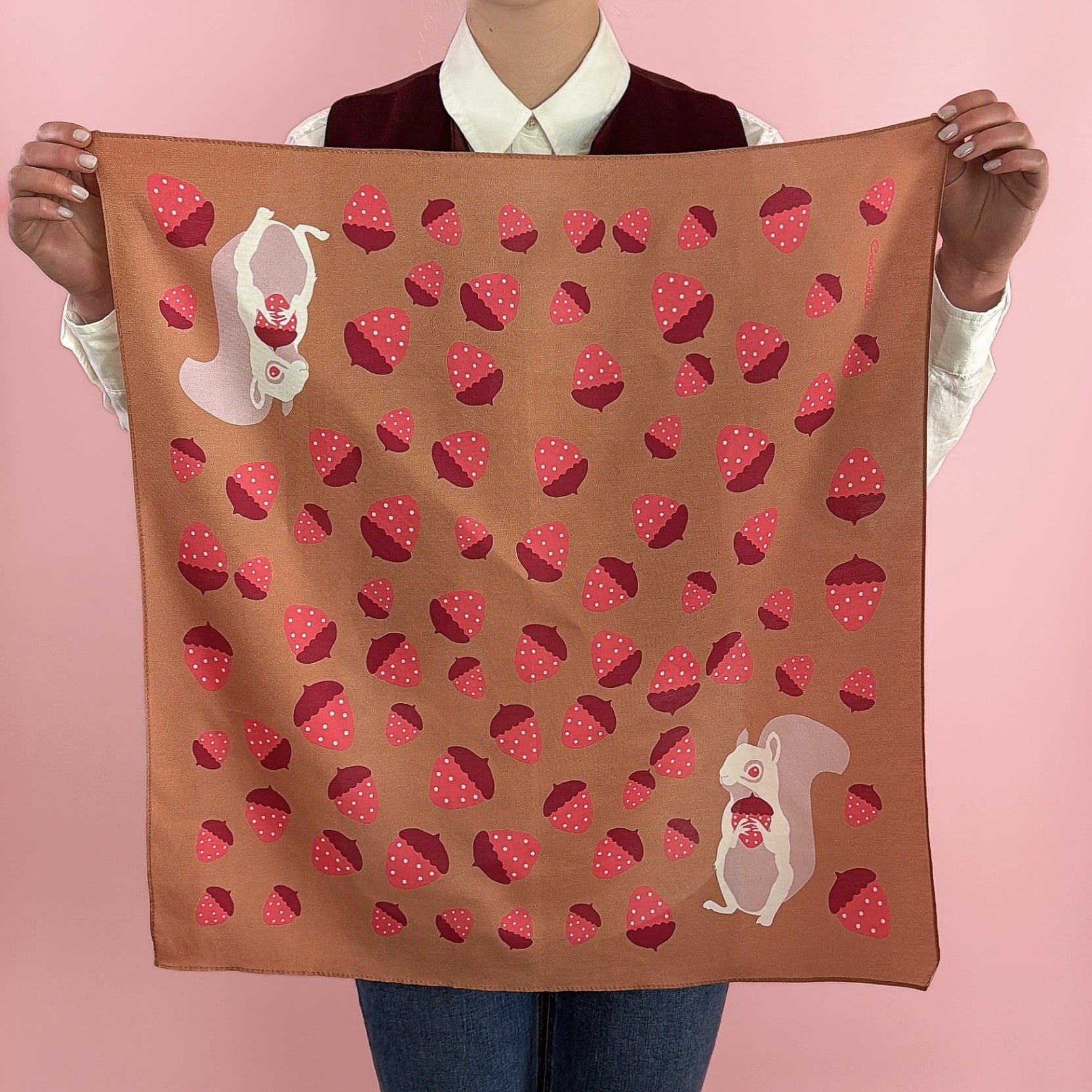 Pink Albino squirrel with a strawberry acorn on mocha mousse brown and burgundy cotton silk bandana from centinelle. Made of a luxurious cotton and silk twill blend with a precise machine-stitched hem. Ethically sourced 