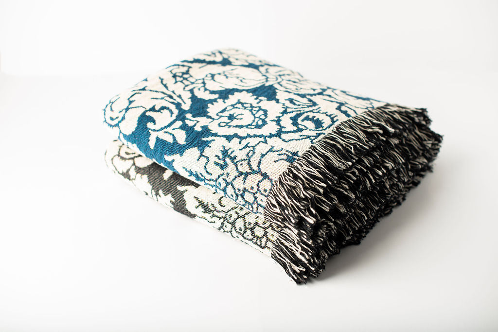 Verona damask floral woven throw blankets stacked in two colorways