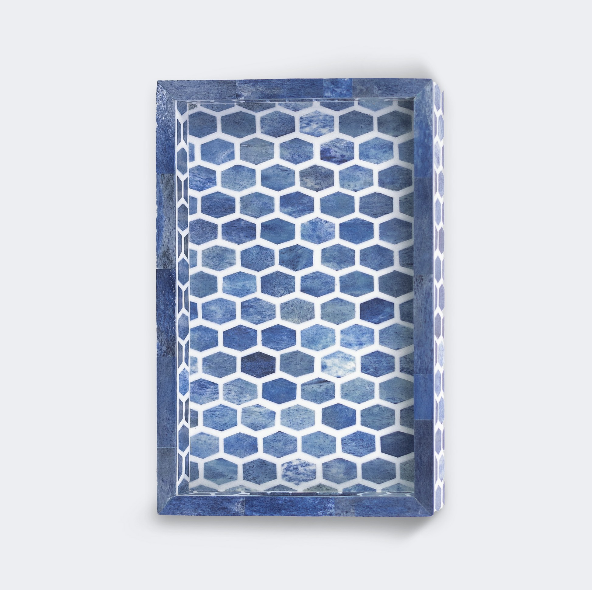 Close-up of tray surface and matching coaster design