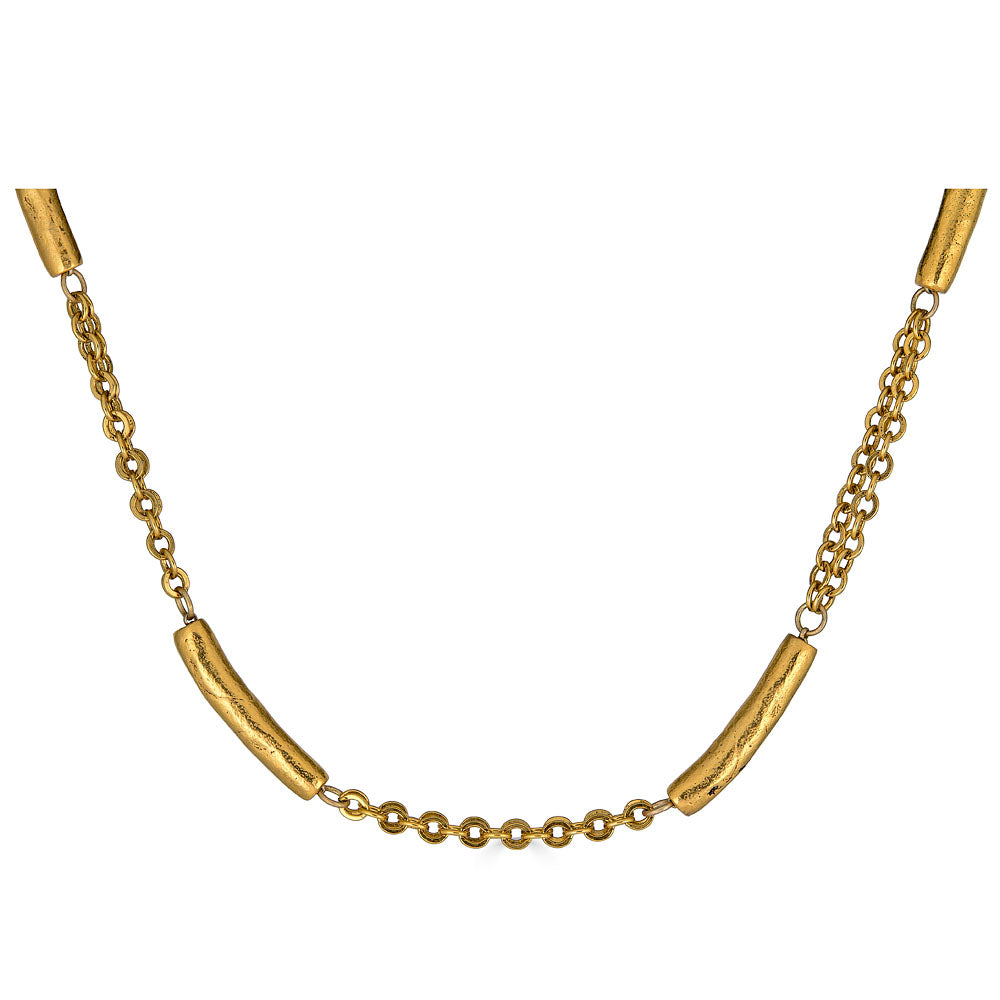 Gold-plated necklace with textured tube beads spaced along a double chain.