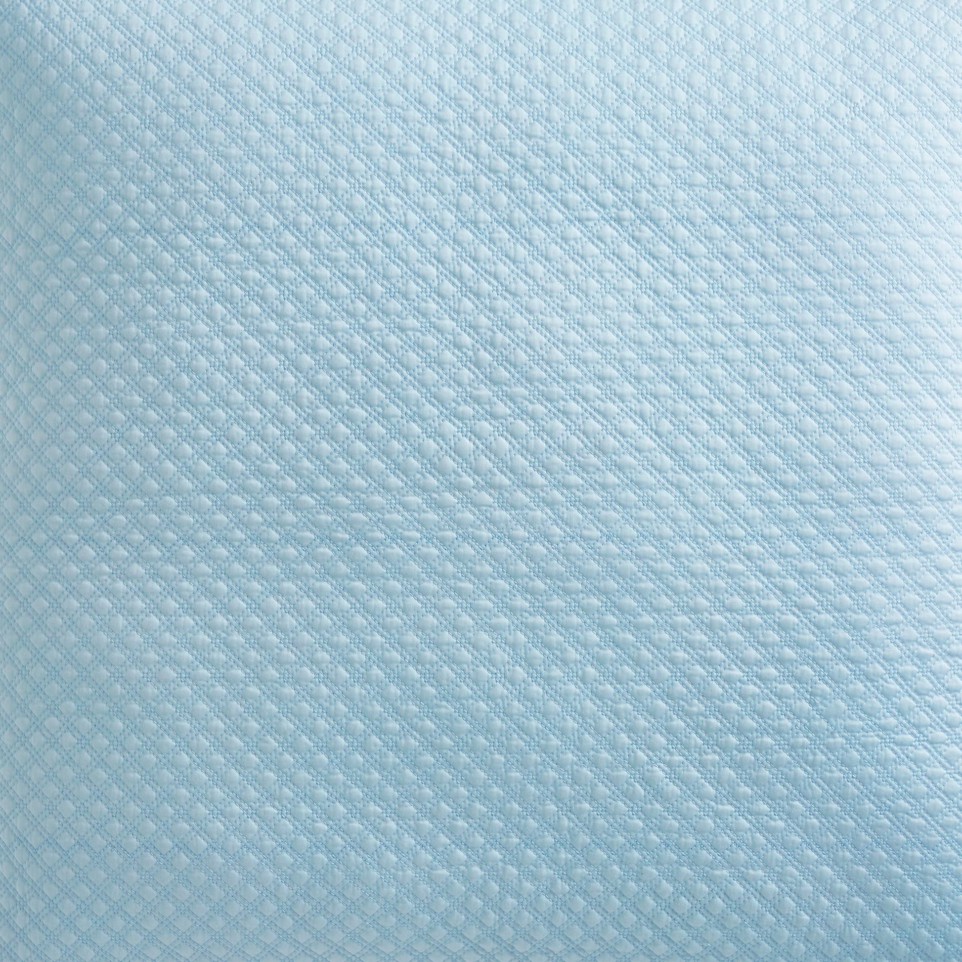 SS-251-2026_3|Close-up of serene light blue diamond-quilted coverlet fabric, offering elegant texture and a calming aesthetic for bedding.