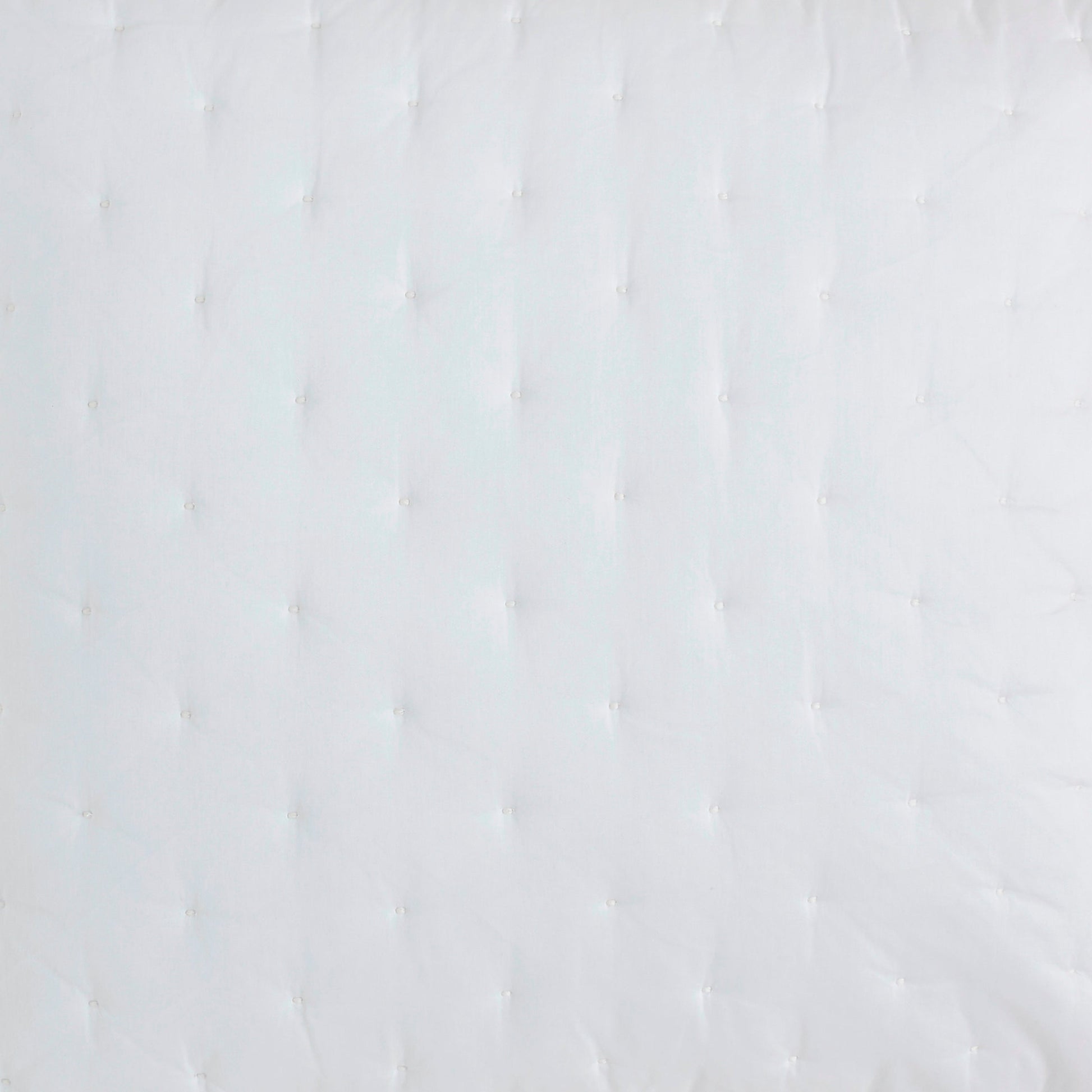 SS-349-2026_2|Close-up of white quilted material with simple grid stitching. Clean, classic, and comfortable quilt fabric detail for bedding.