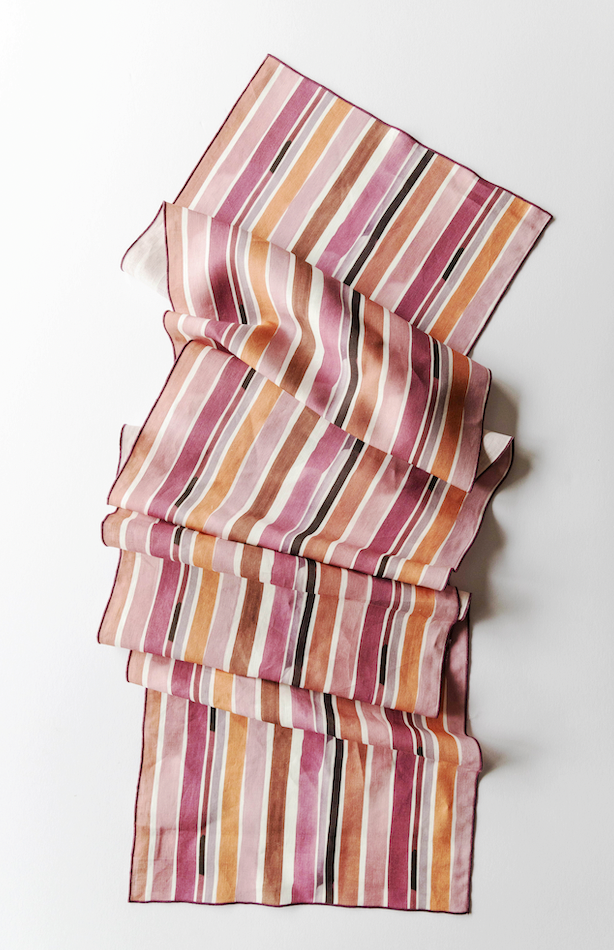 Lisbon Stripe linen table runner flat lay close up of hand-painted stripe detail - Goldie Home