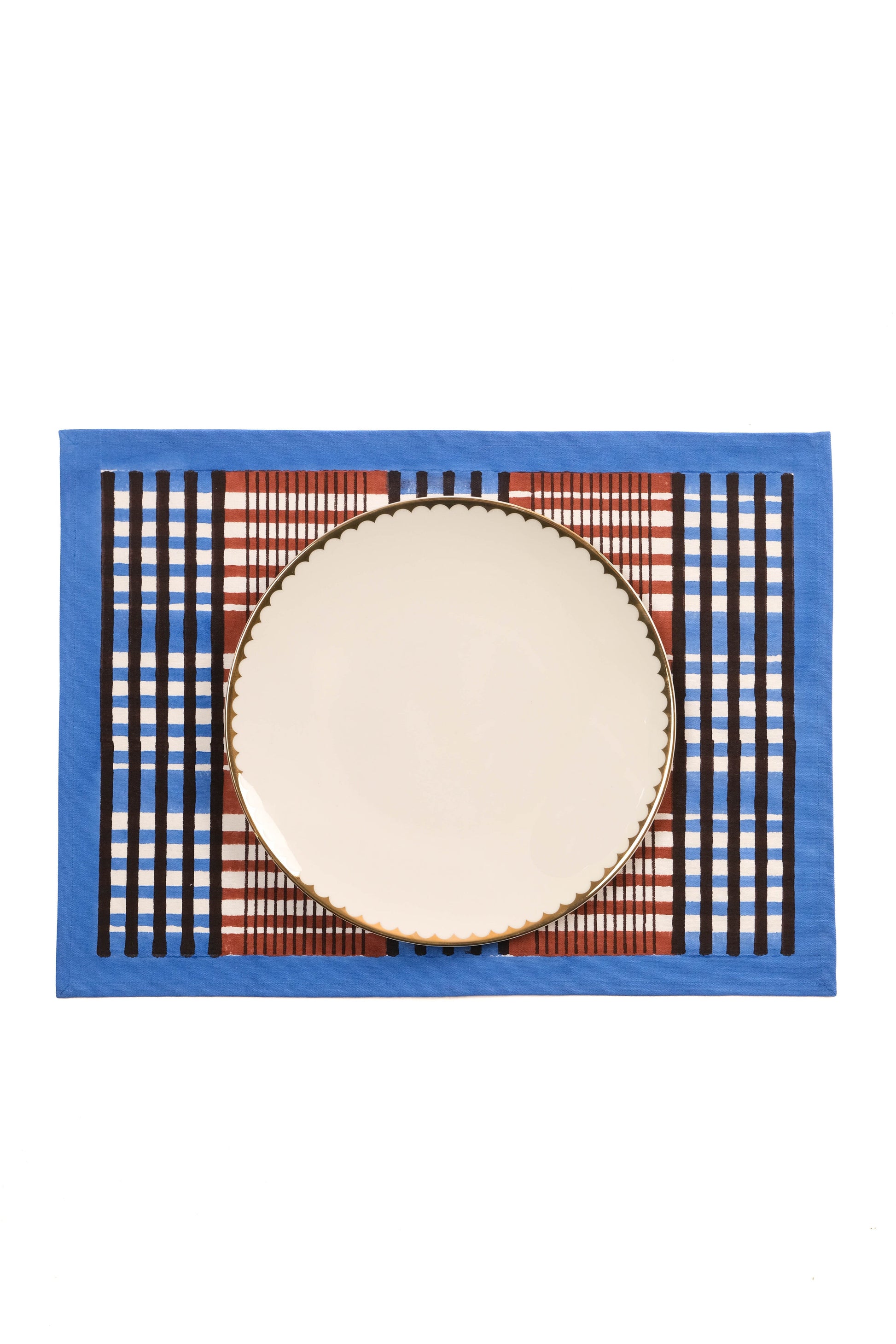 Single brown and blue Shetland plaid blockprint placemat with white plate
