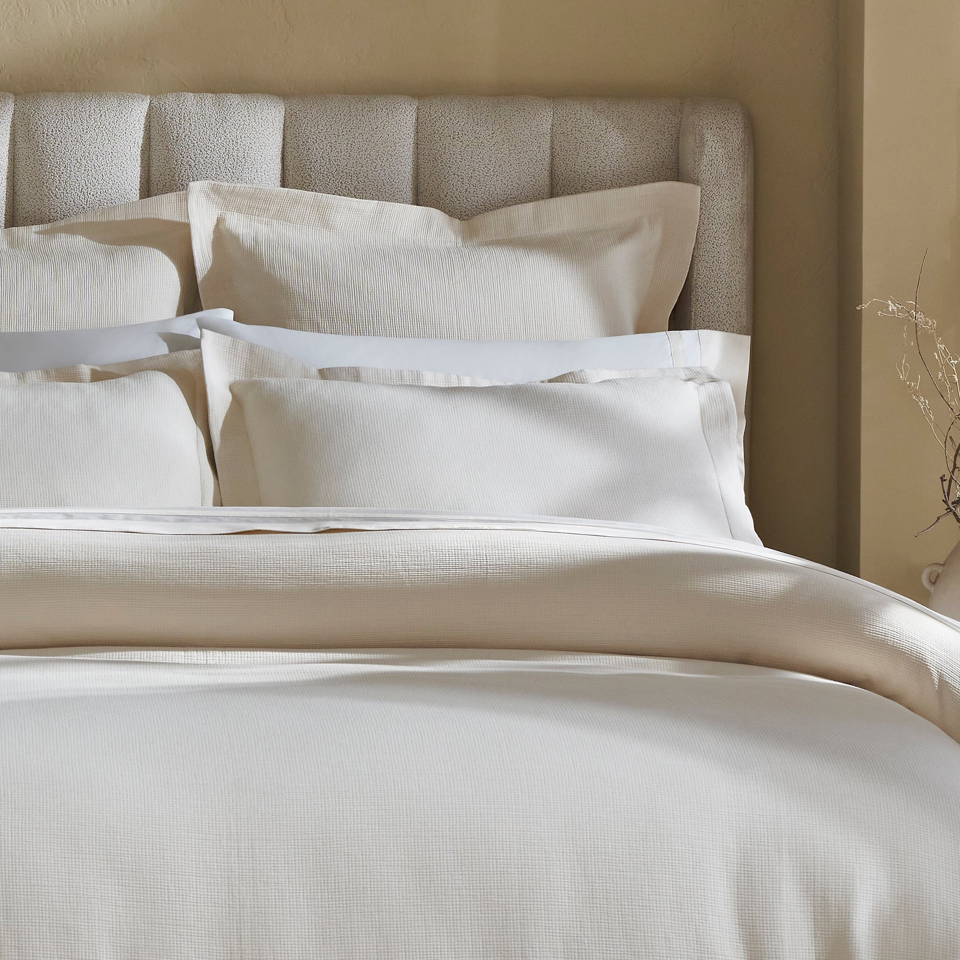 DT-068-9092_3|Close-up of luxurious cream textured duvet cover, soft woven pattern bedding, elegant and inviting, a perfect neutral aesthetic.