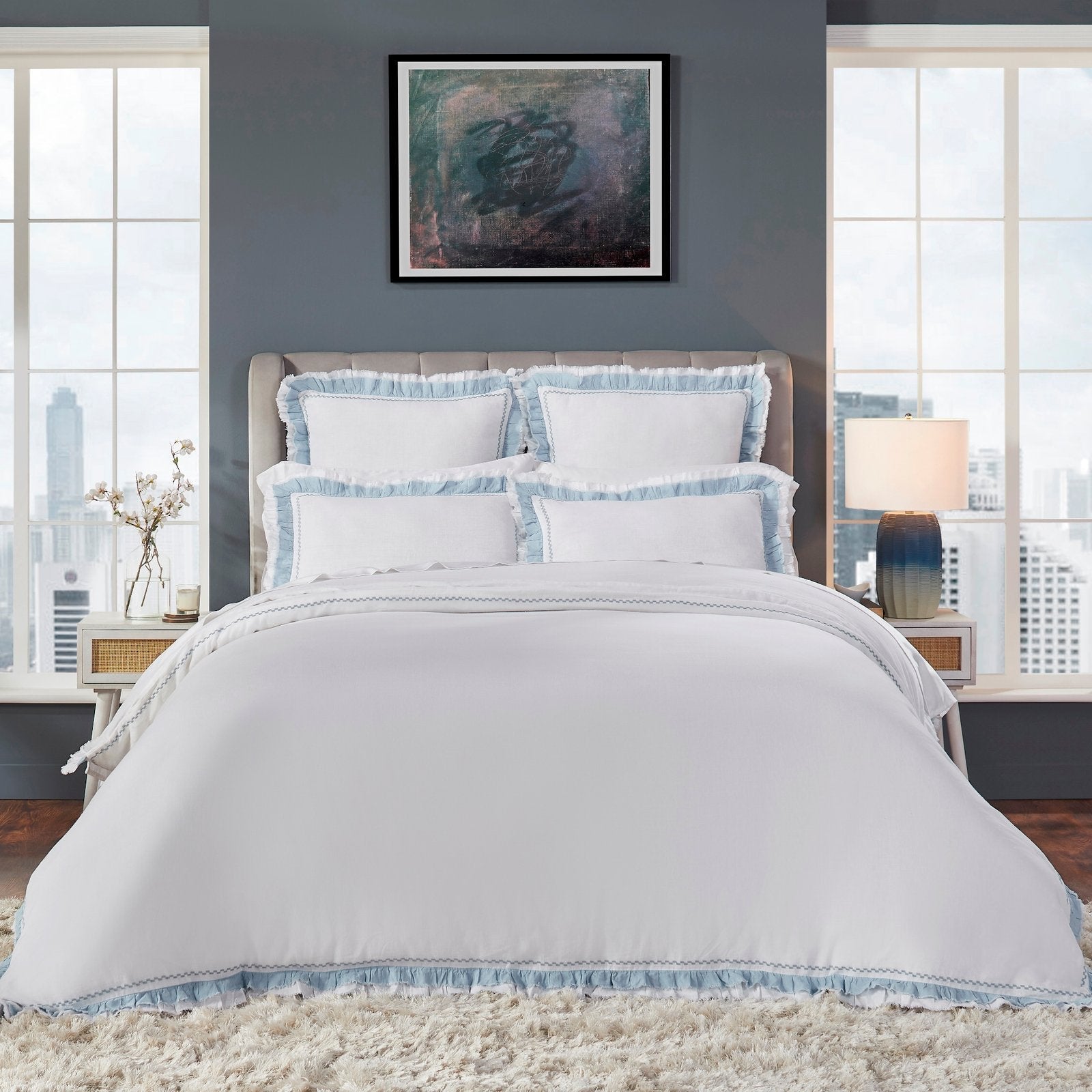 DT-028-X_1|Luxurious white bedding set with ruffled light blue trim on pillows & duvet. Elegant bedroom decor.