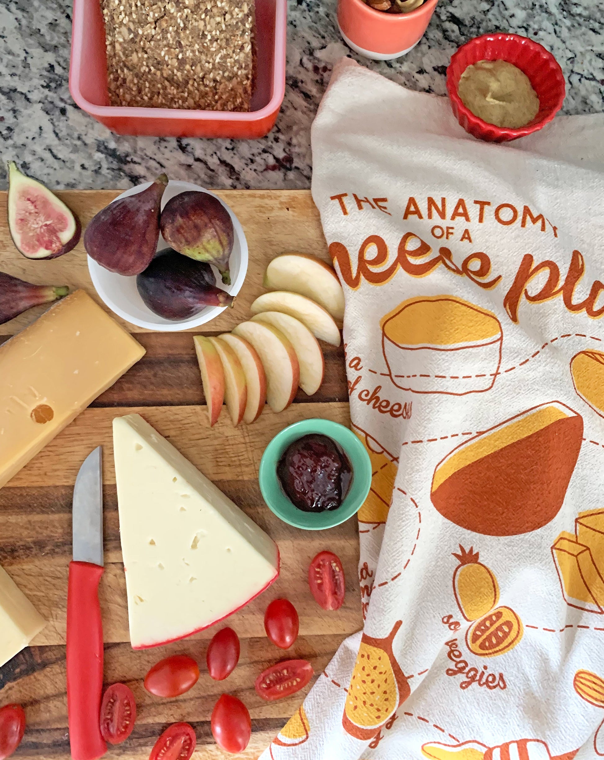 Screen-printed cheese dish towel on cheese plate