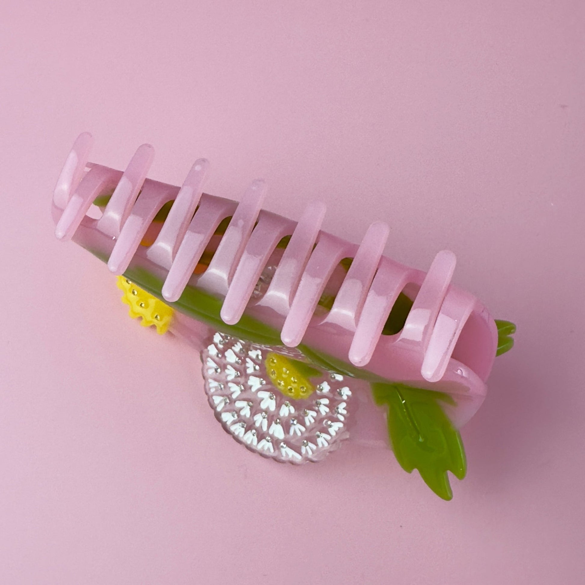 Exquisite dandelion hair claw on pink, green and yellow, with little crystals from Centinelle. Handmade on cellulose acetate, with splice technique, exquisite miniature details and crystals, that are tied directly to its value and make them unique and special. 