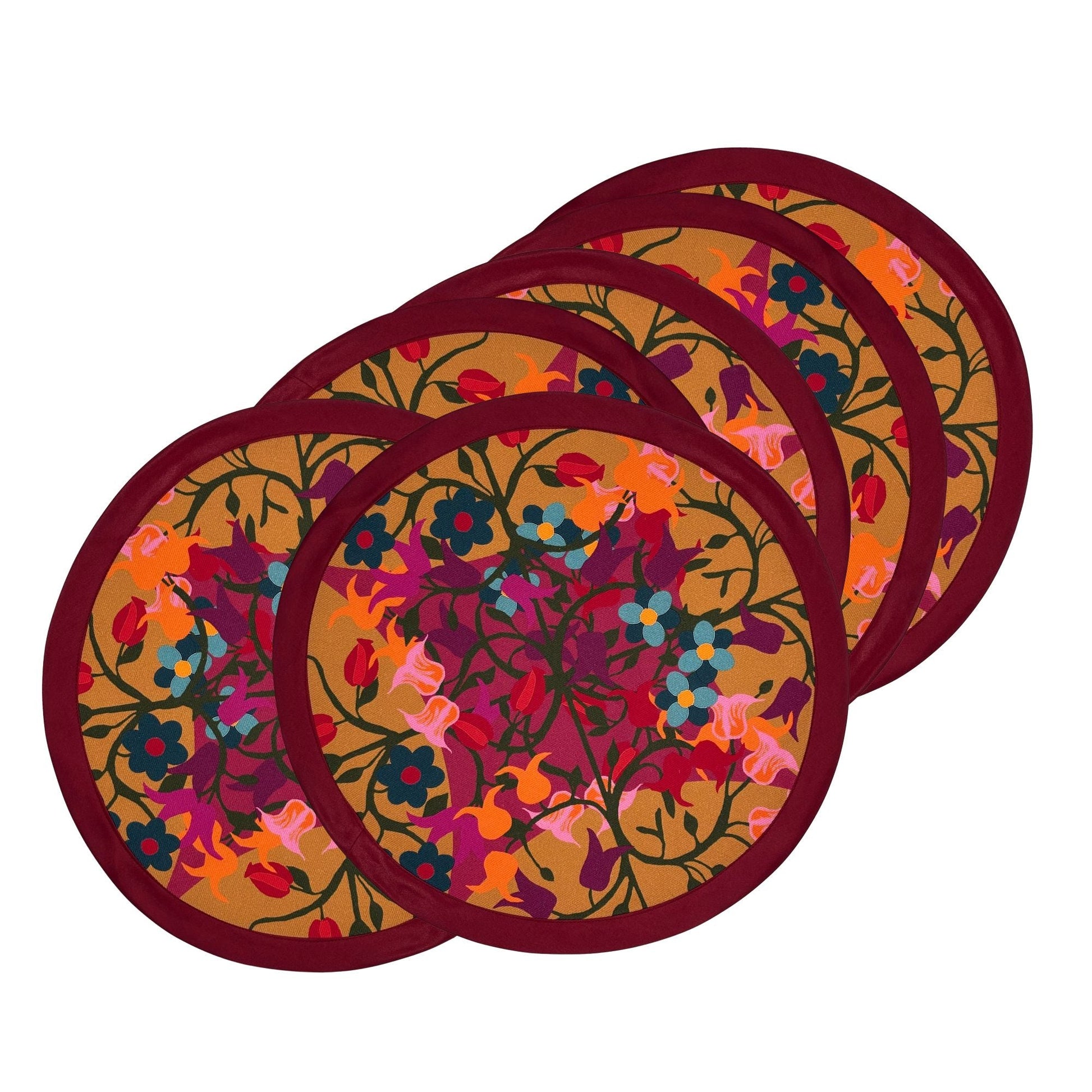 Round organic cotton placemat in orange and bordeaux floral geometric print.