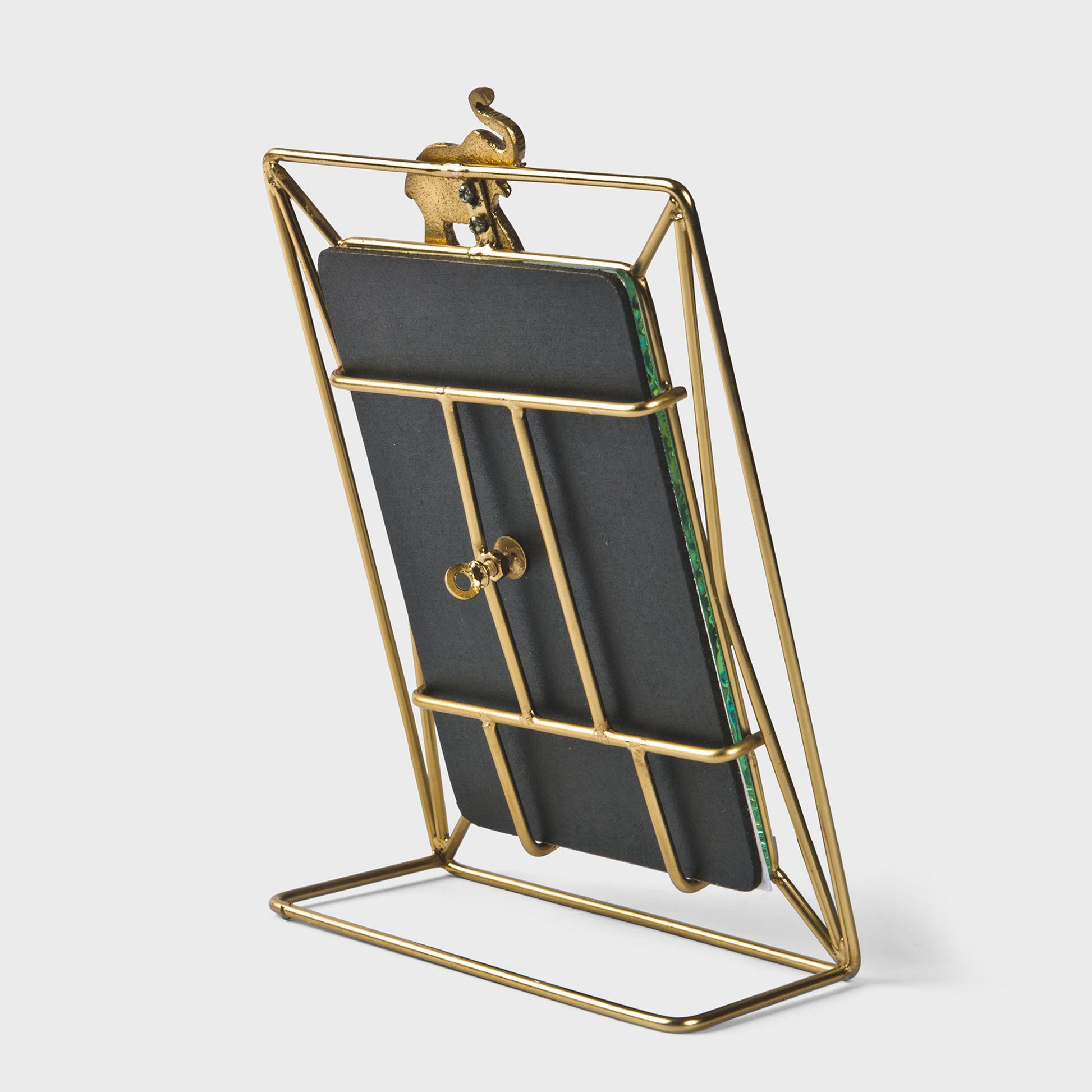 Gilded 5x7 frame with a signature elephant detail, perfect for global-inspired interiors.