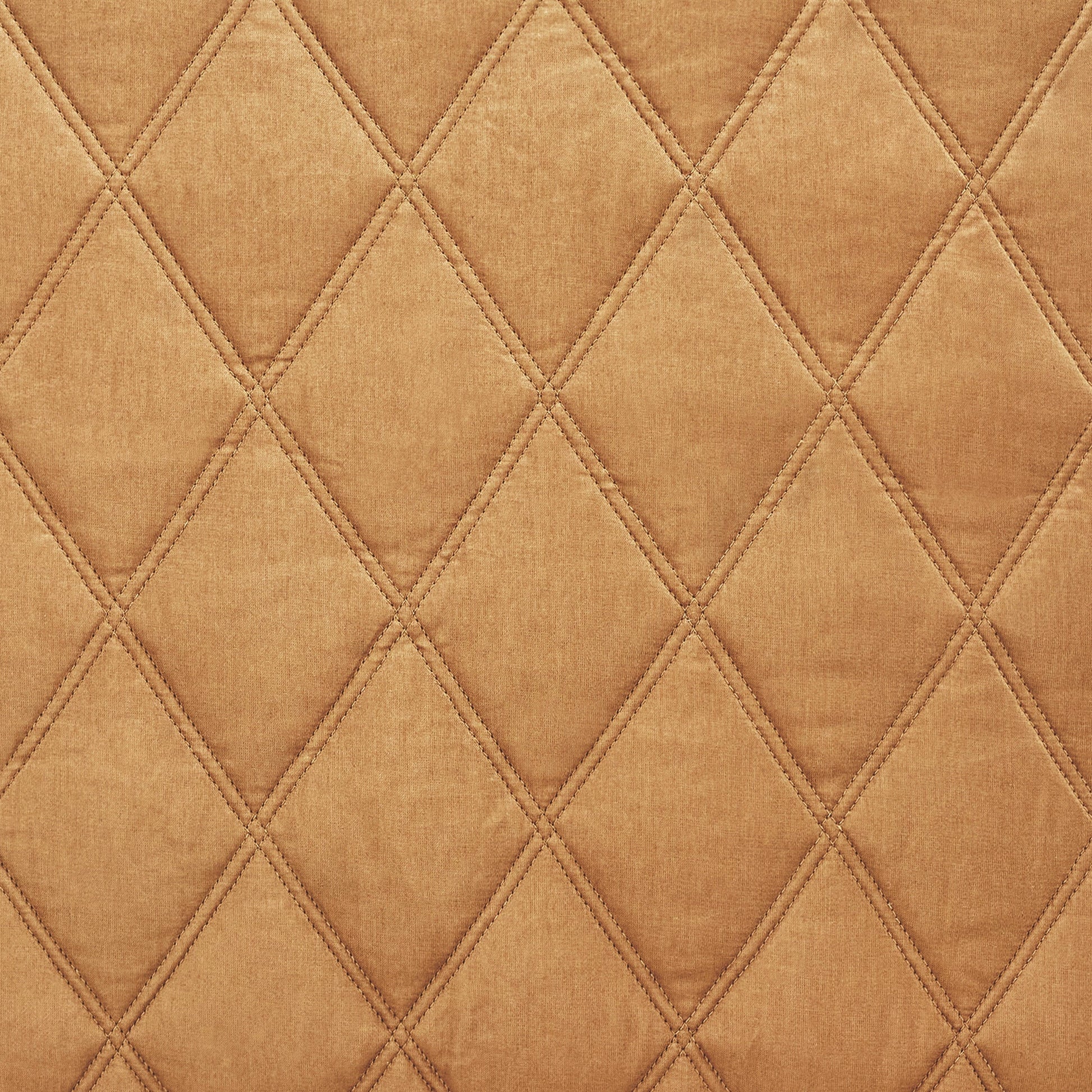 CL-260-11096_10|Close-up of golden bronze quilted coverlet fabric, highlighting the soft texture and precise diamond stitching for luxury.