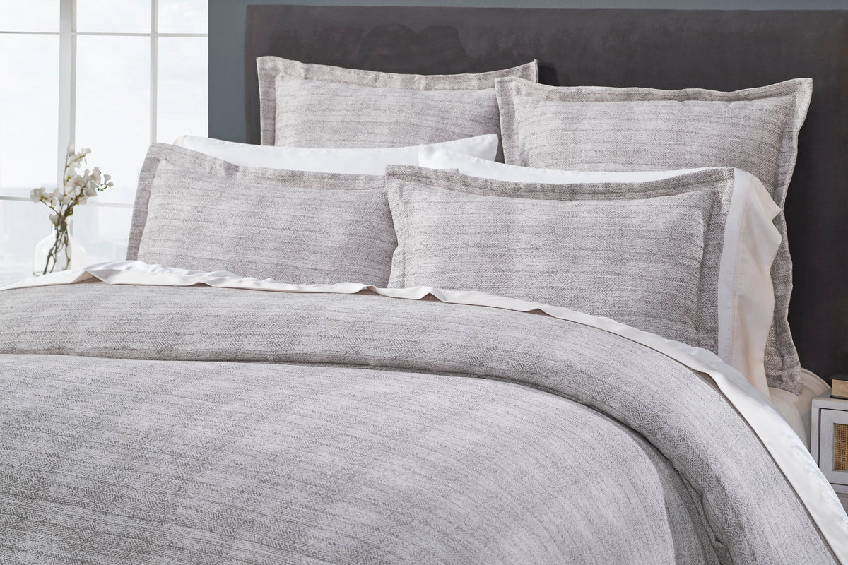 DT-032-X_2|Detailed close-up of a stylish grey textured duvet cover and matching shams, perfect for modern bedrooms.