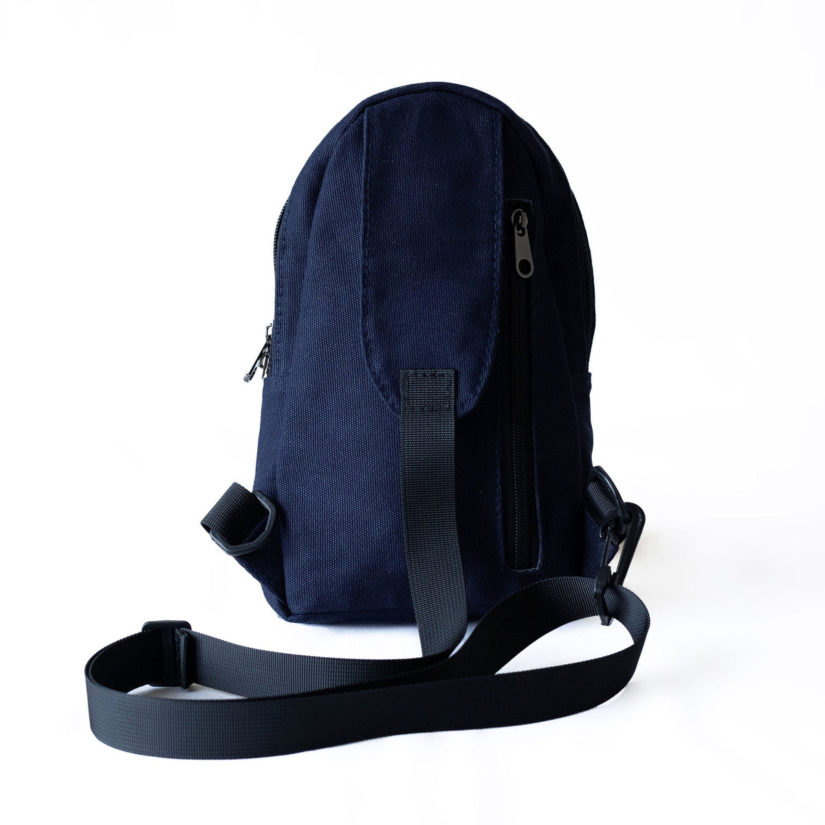 Buru small canvas sling bag in navy blue #color_navy-blue