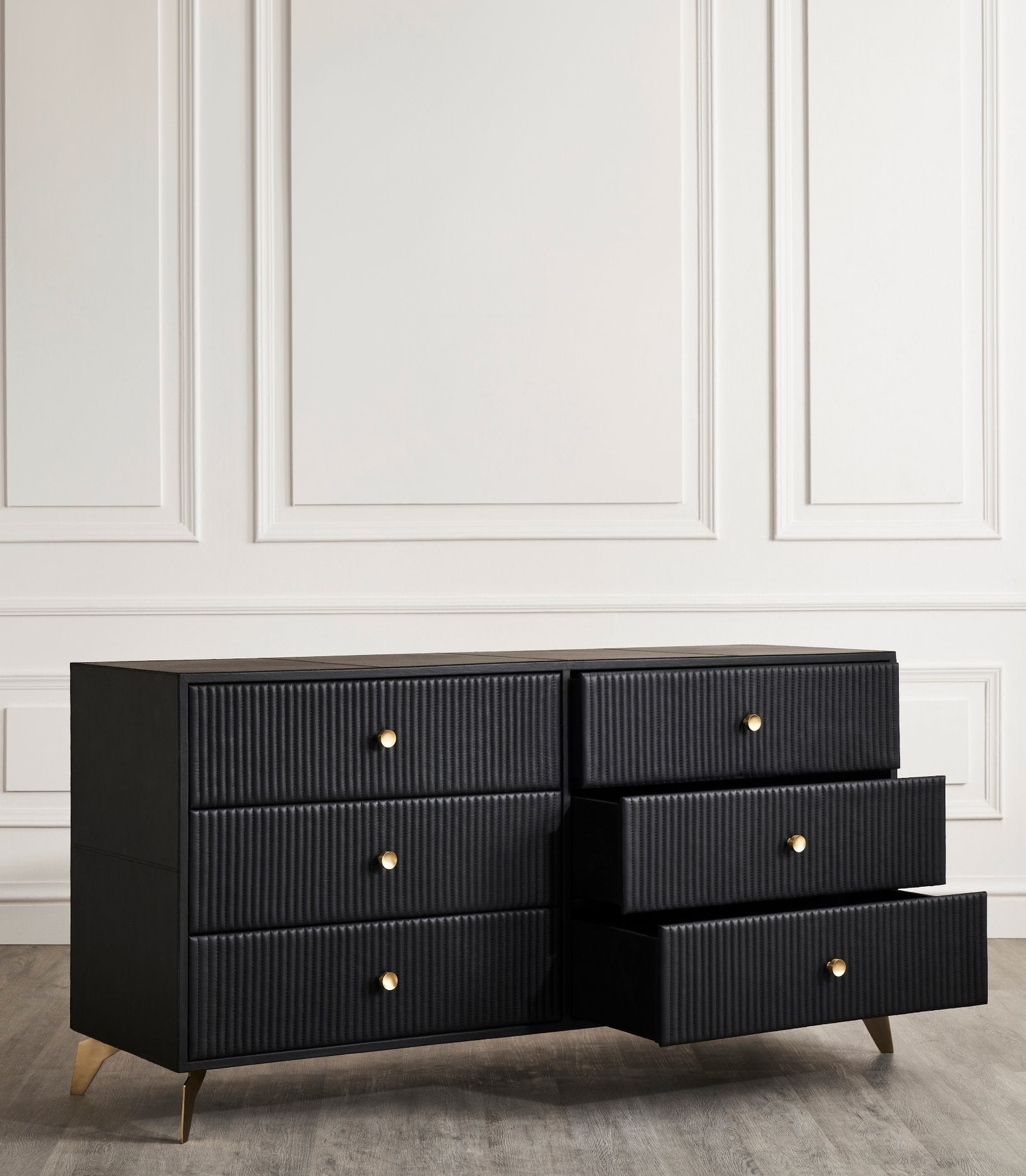 FN-5202-642033_5|Stylish black leather-clad dresser with unique channel-tufted drawers and chic gold hardware, perfect for luxurious bedrooms.