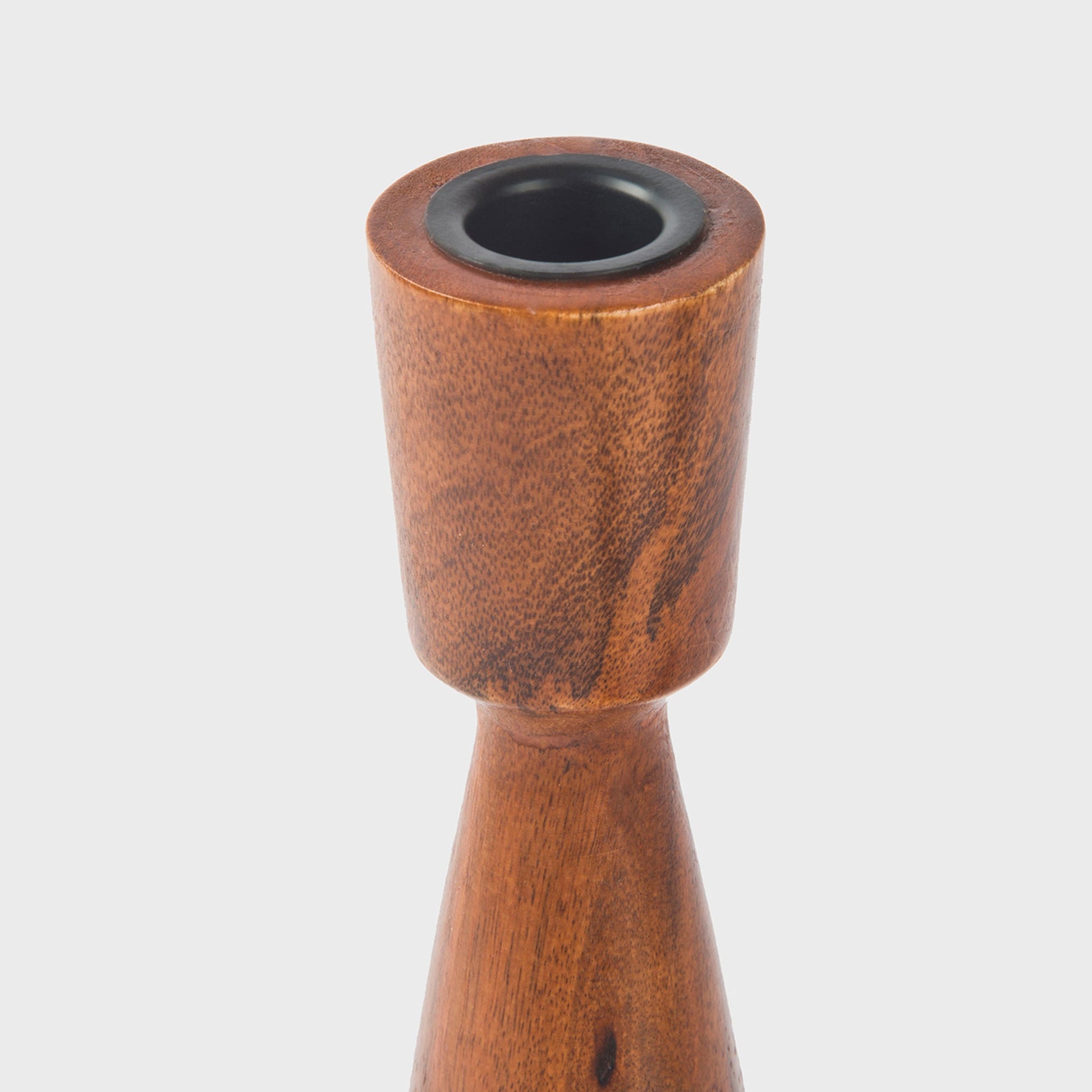 Sleek, hand-finished wooden taper holders with a tall, elegant silhouette.