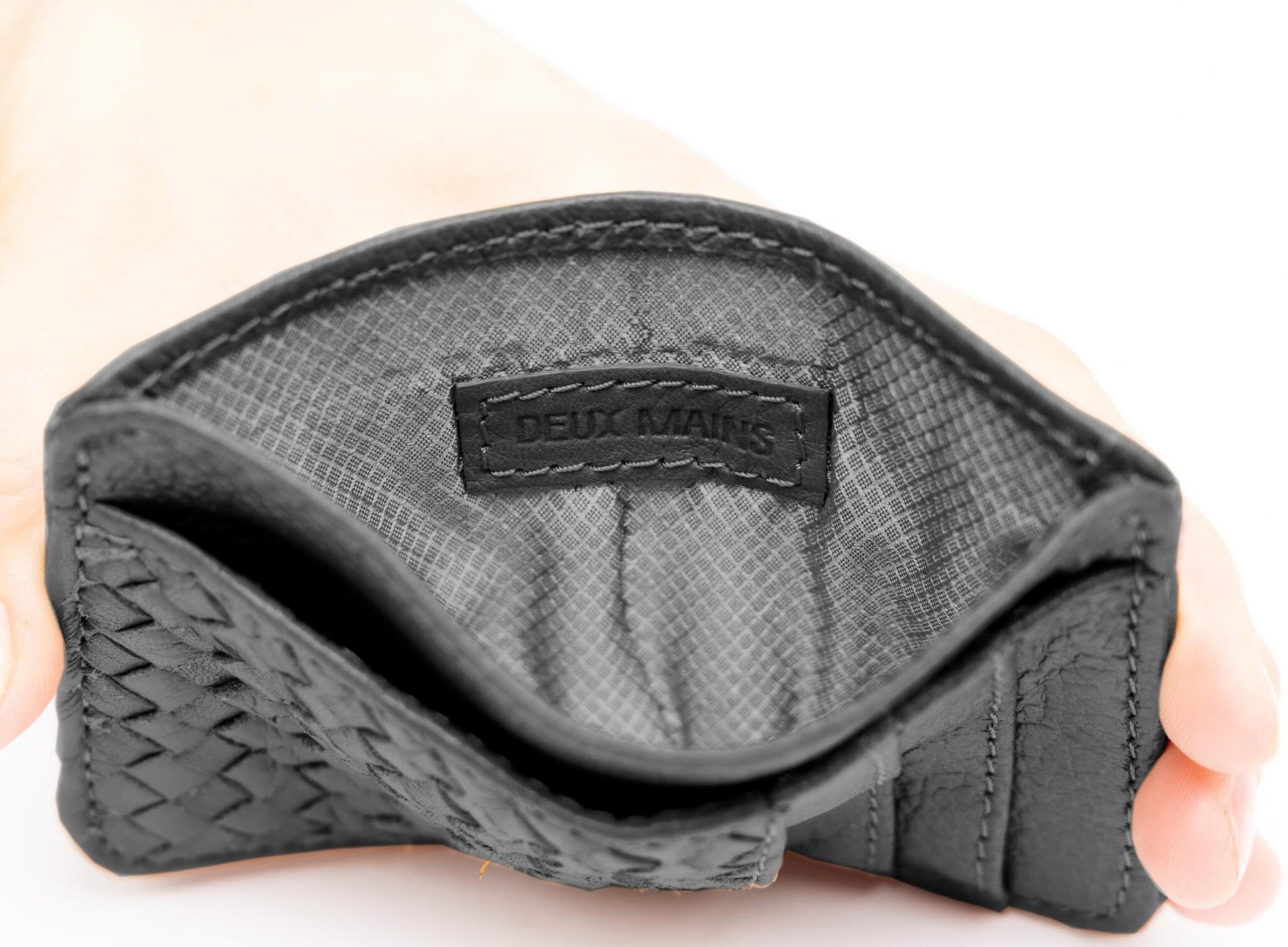 close up interior of the slim id in black.