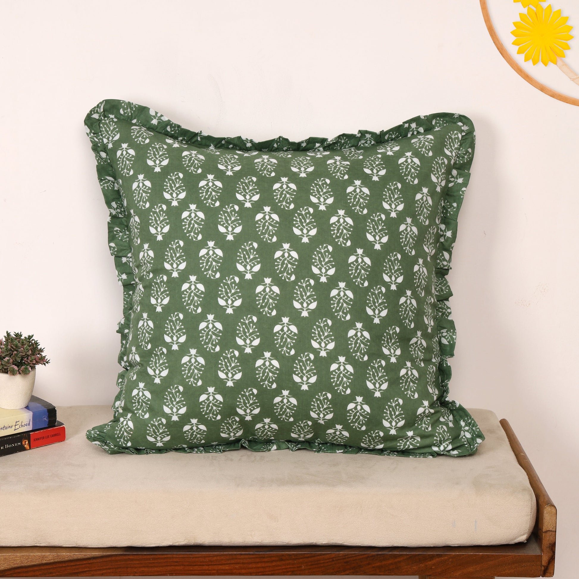 Green block-printed pillow cover with ruffled border