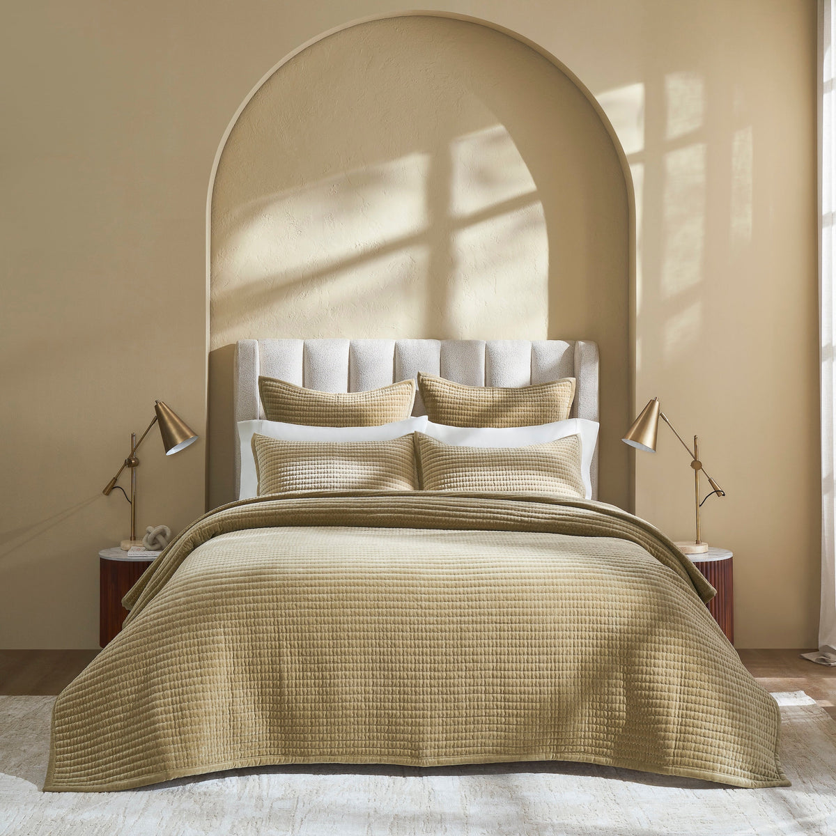 CL-267-11096_2|Inviting gold textured quilted coverlet draped casually over a bed in a sunlit bedroom. Stylish, comfortable, modern bedding.