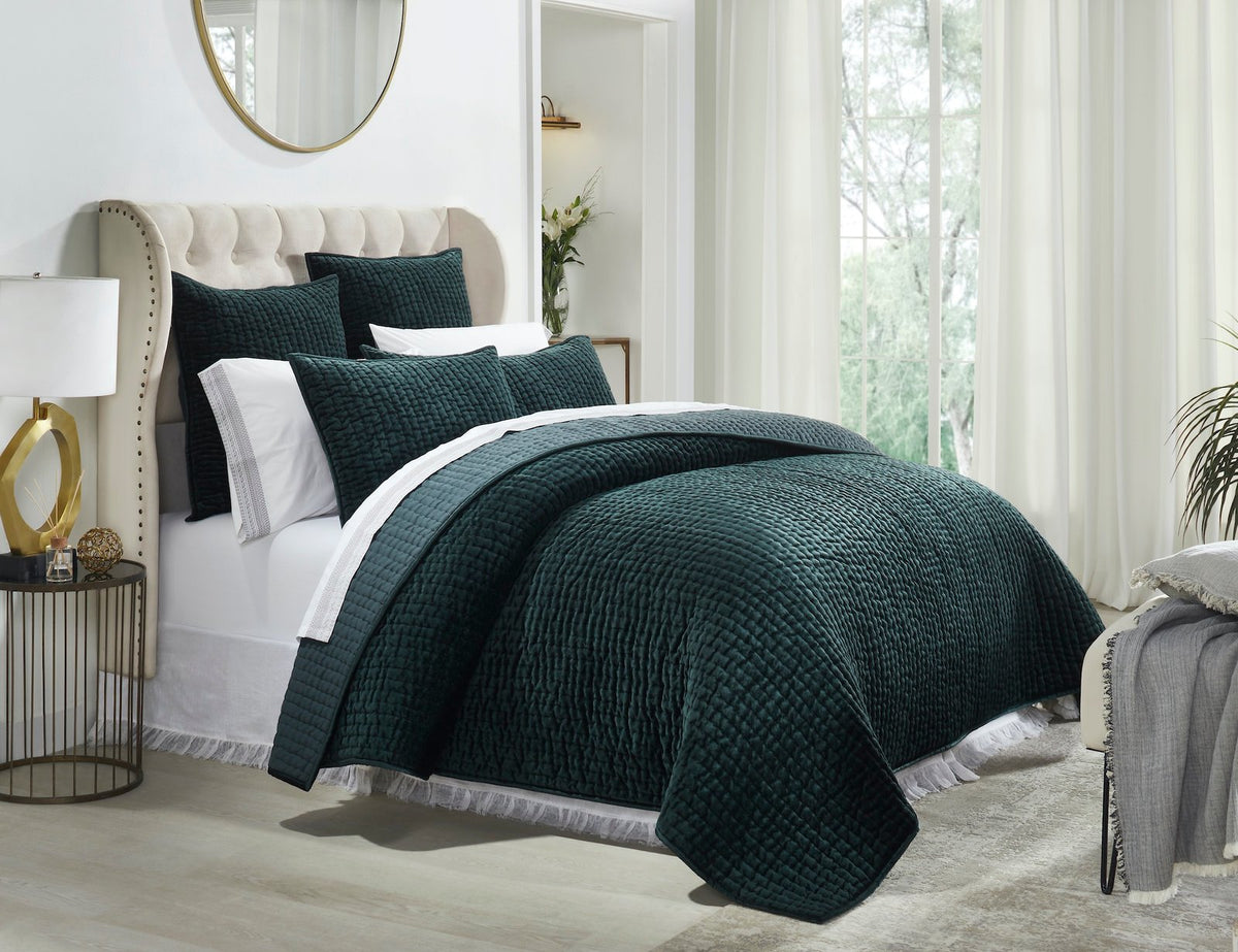 QT-363-9496_1|Dark green velvet quilted bedspread on a bed, adding a rich, luxurious touch and cozy comfort to modern bedroom decor.