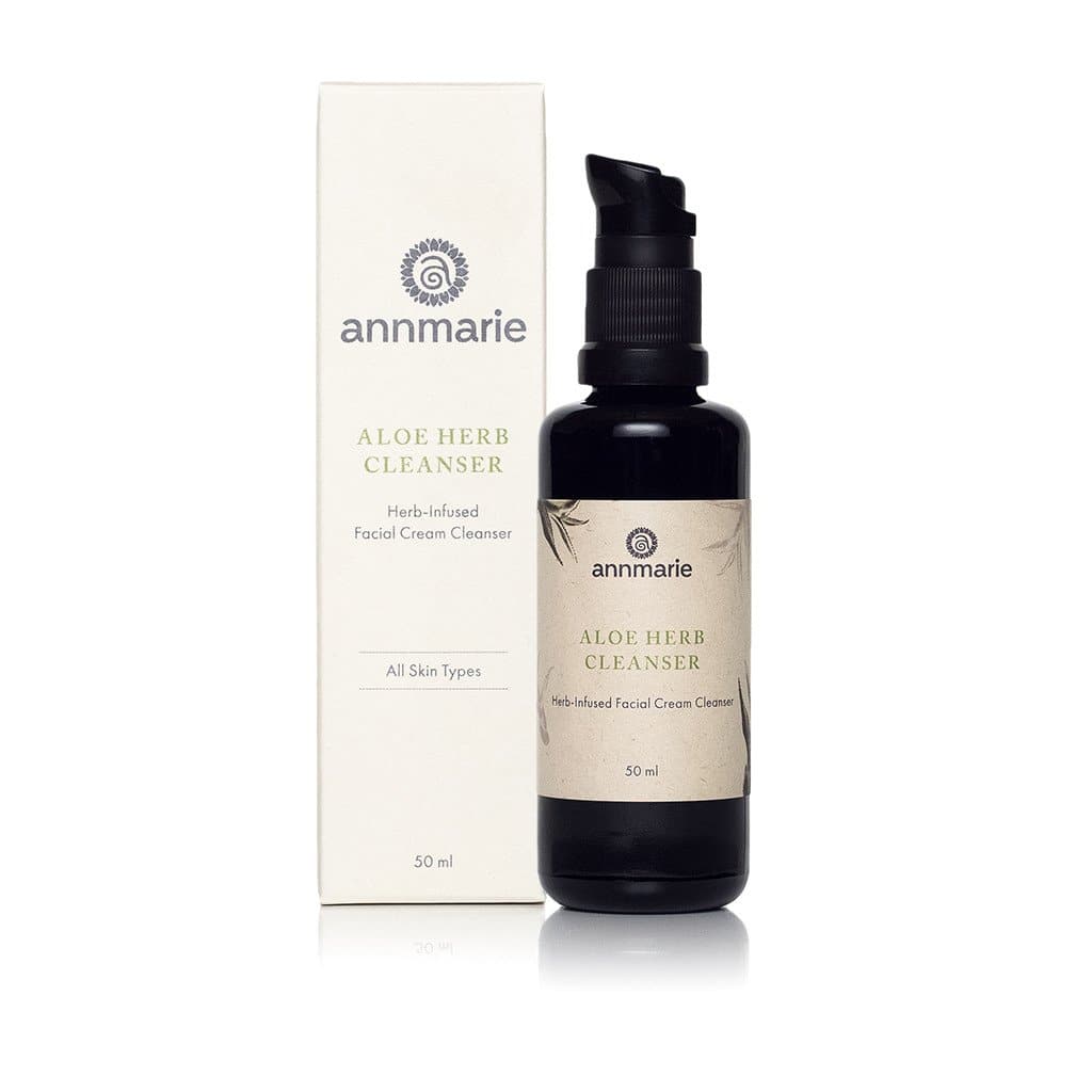 Annmarie Aloe Herb Cleanser herb-infused facial cream cleanser bottle with packaging for all skin types featured on with a white plain background.
